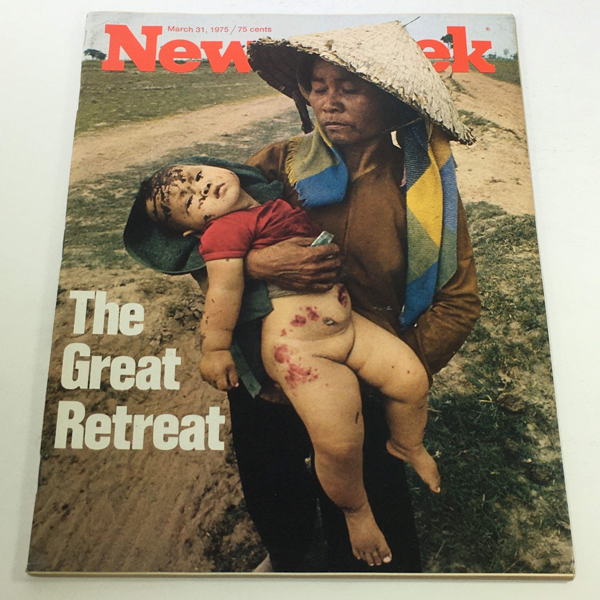 Cover of the VTG Newsweek Magazine dated March 31, 1975, featuring the article titled 'The Great Retreat,' showcasing a poignant image related to the magazine's historical context.