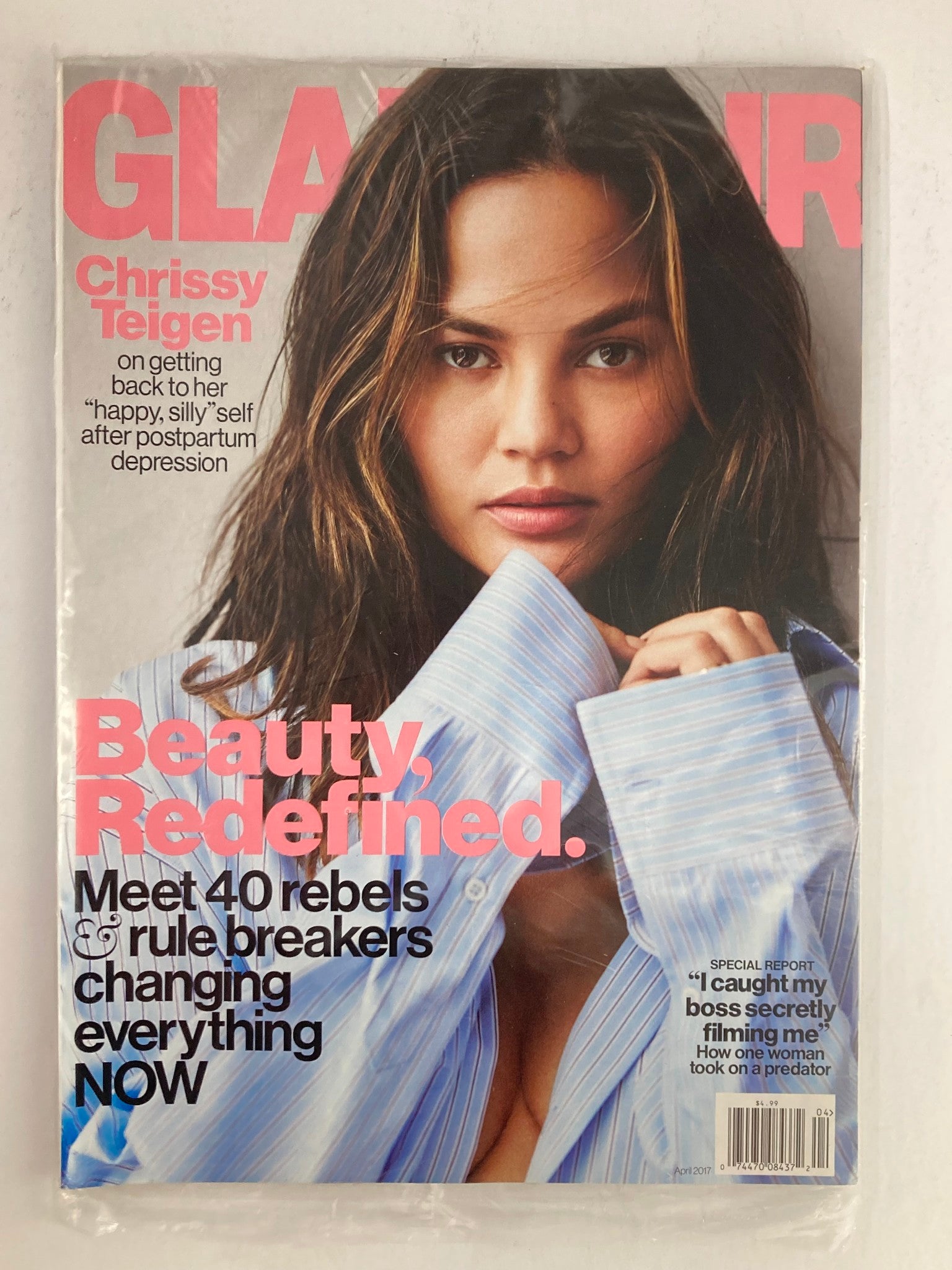 Glamour Magazine April 2017 featuring Chrissy Teigen on the cover, highlighting her journey after postpartum depression with a focus on beauty and self-empowerment.