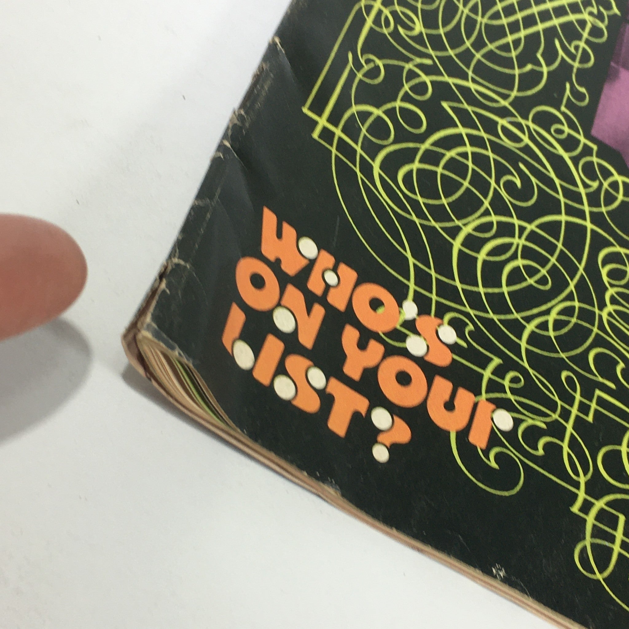 Close-up of the spine of VTG Down Beat Magazine August 16 1973 showcasing the text 'Who's on your list?' and the vintage magazine's aged condition.
