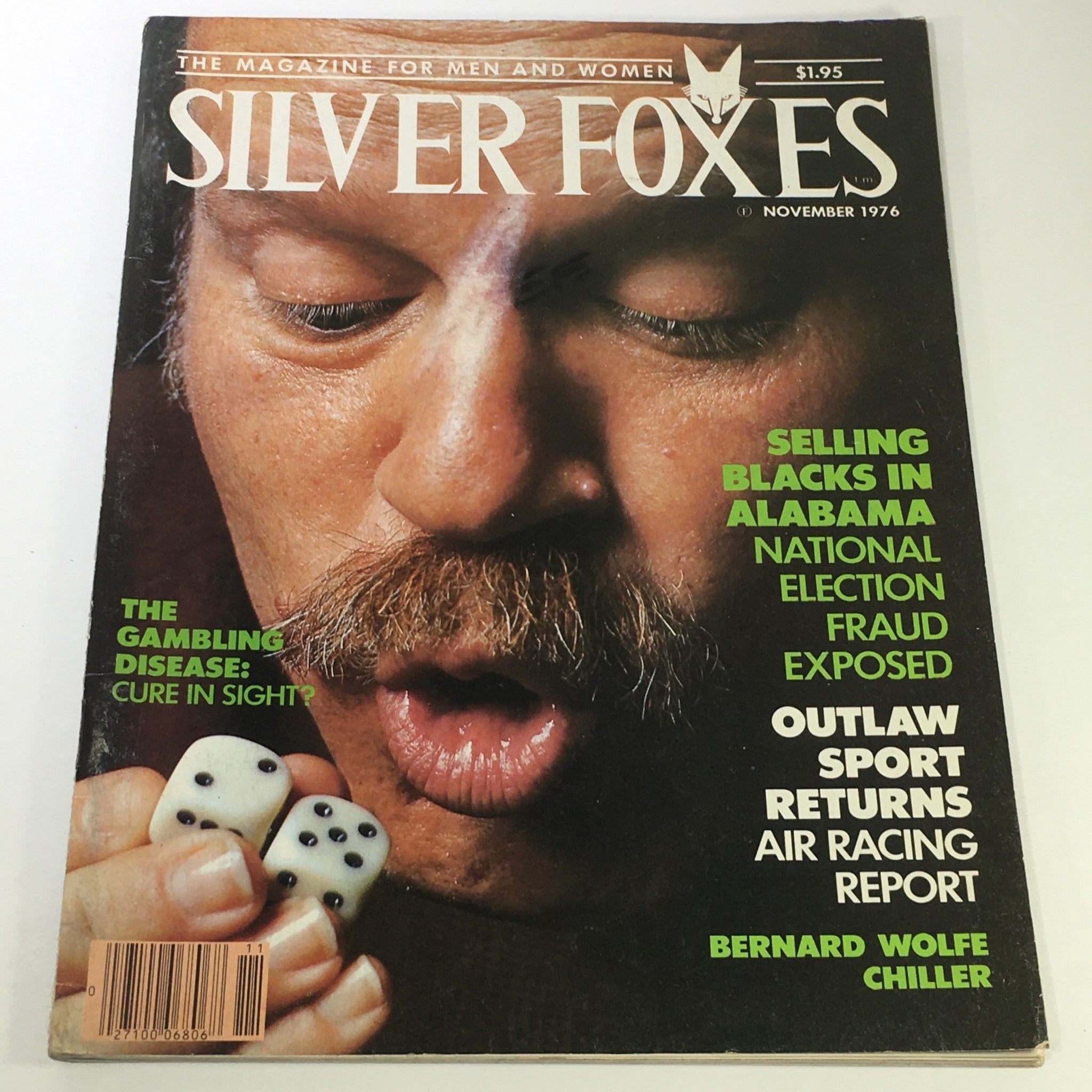 Cover of Silver Foxes Magazine November 1976 featuring the article 'The Gambling Disease' by Bernard Wolfe, depicting a man holding dice.