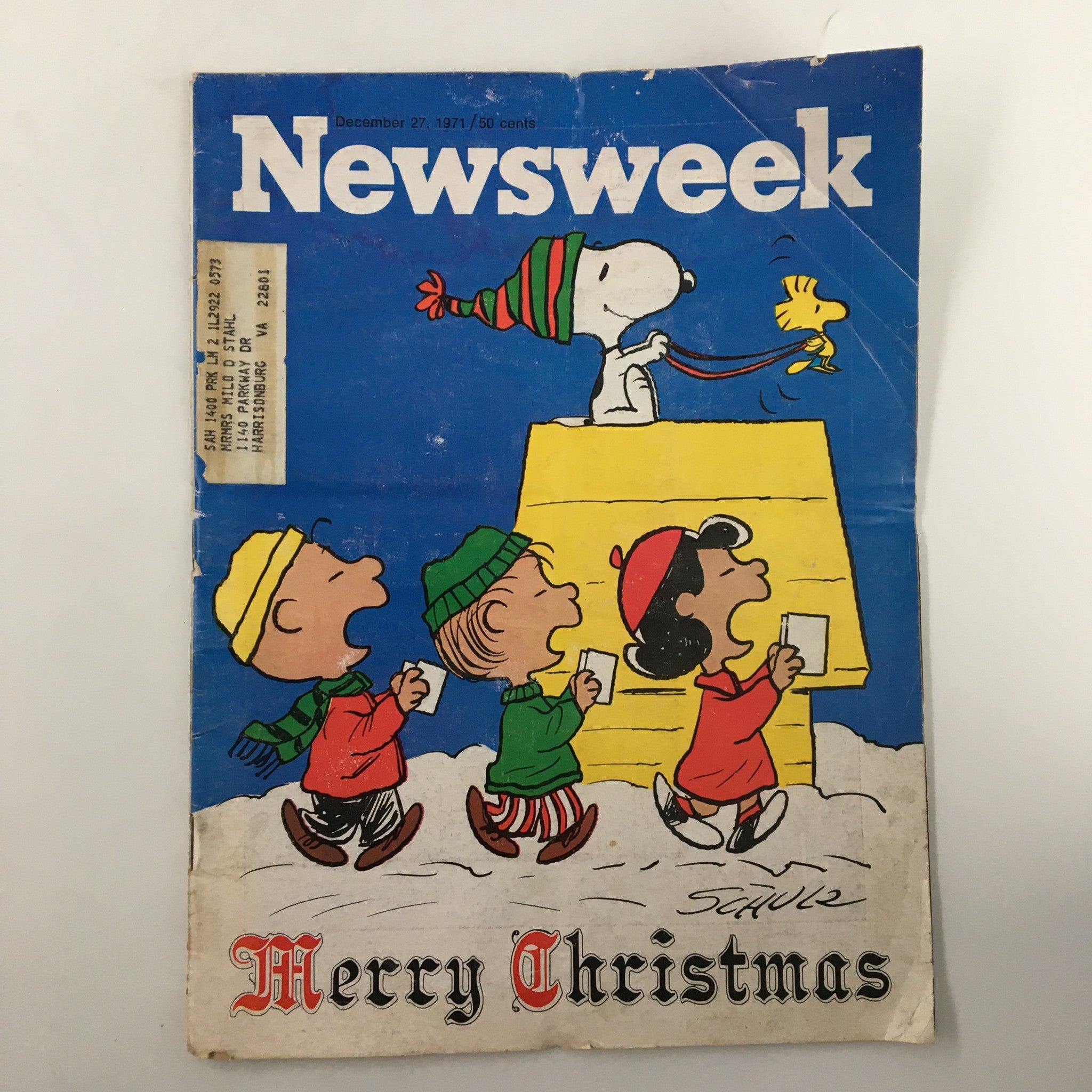 Vintage Newsweek magazine December 27, 1971 featuring Snoopy and friends with a Merry Christmas theme, showcasing four Peanuts characters in winter clothing.