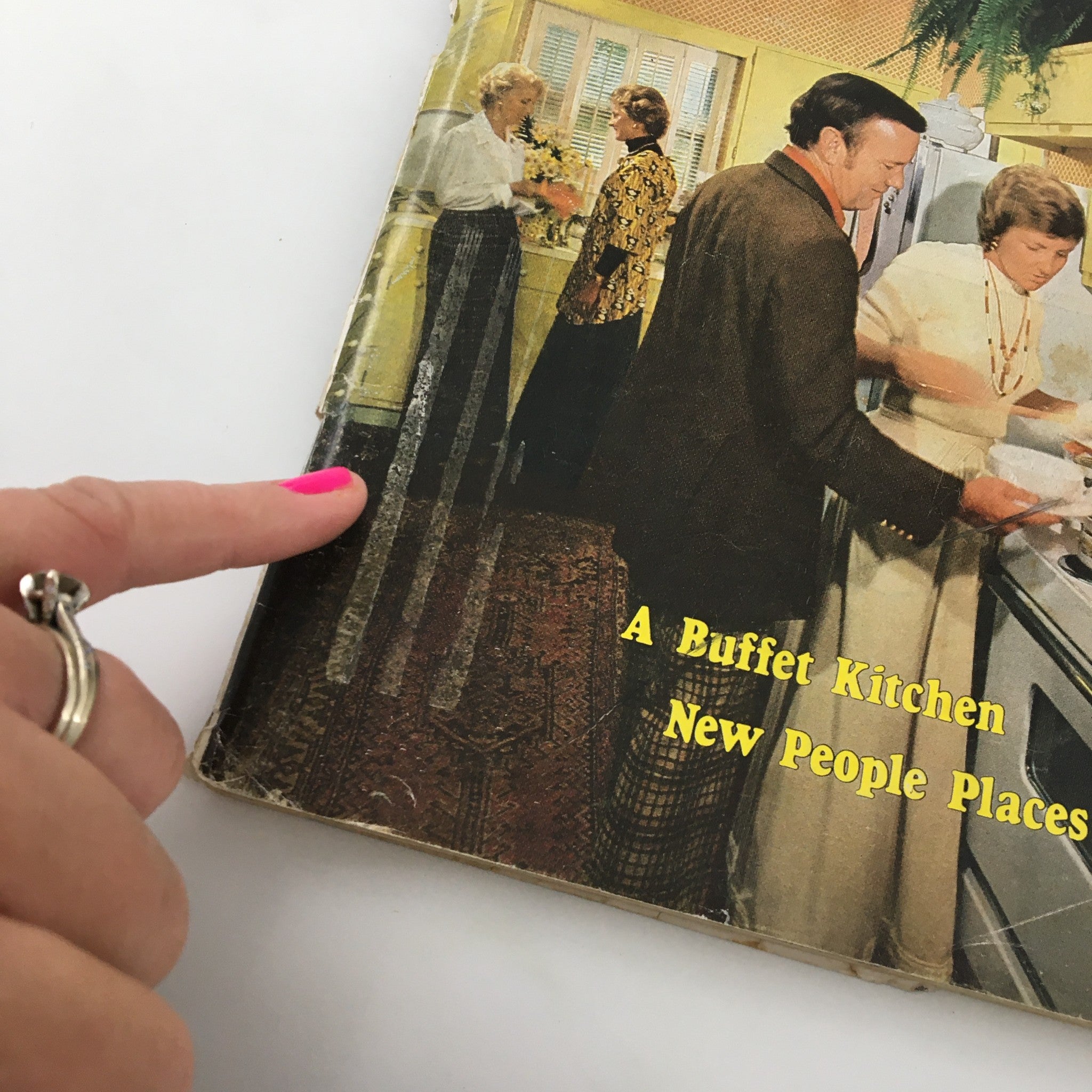 Cover of VTG Southern Living Magazine November 1975, featuring the theme 'A Buffet Kitchen' with guests interacting in a cozy kitchen environment.