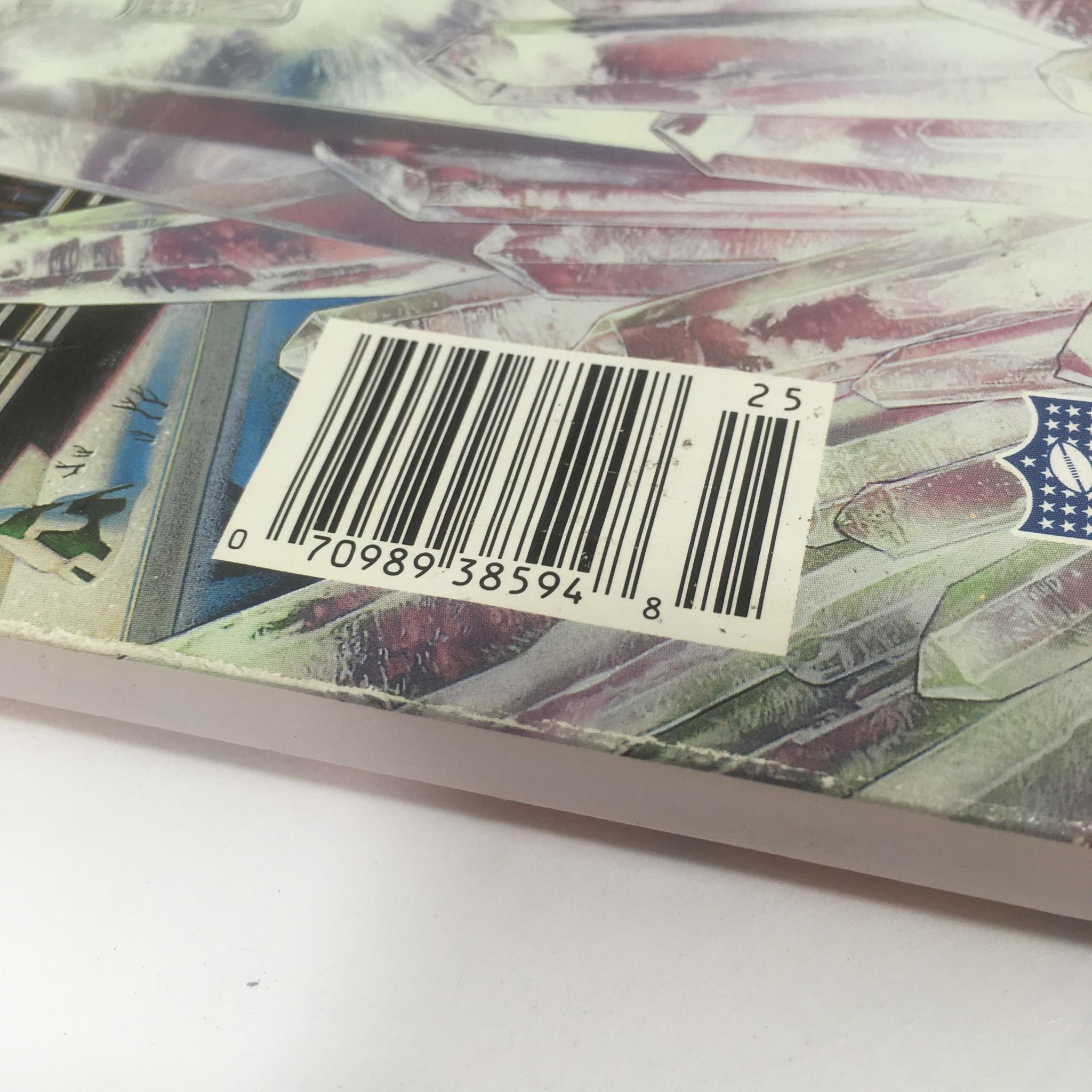 Back cover of the Super Bowl XXVI Game Program from January 26, 1992, displaying a barcode and colorful graphics.
