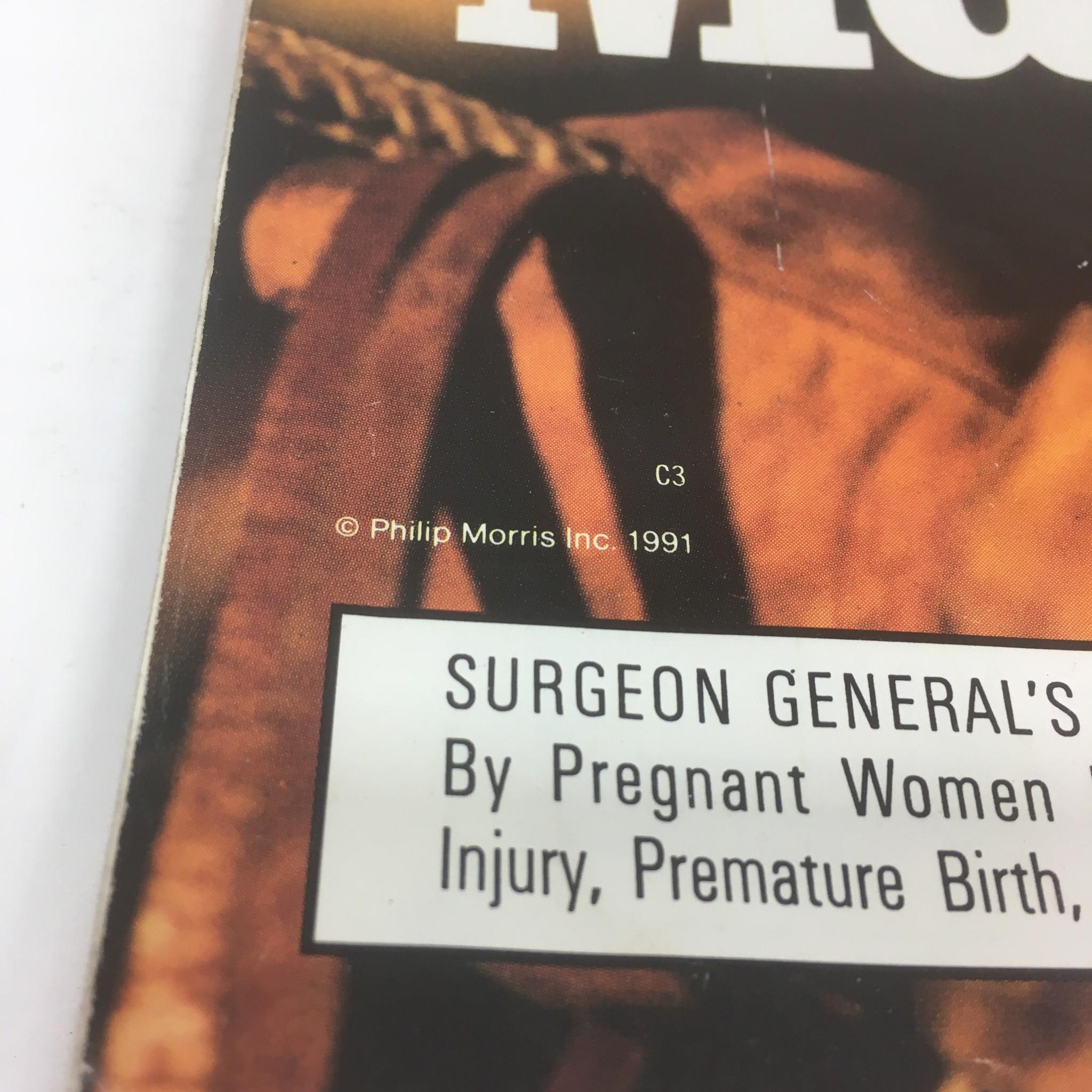 Detailed view of the Marlboro advertisement on the Super Bowl XXVI Game Program from January 26, 1992, showing the surgeon general's warning on smoking.