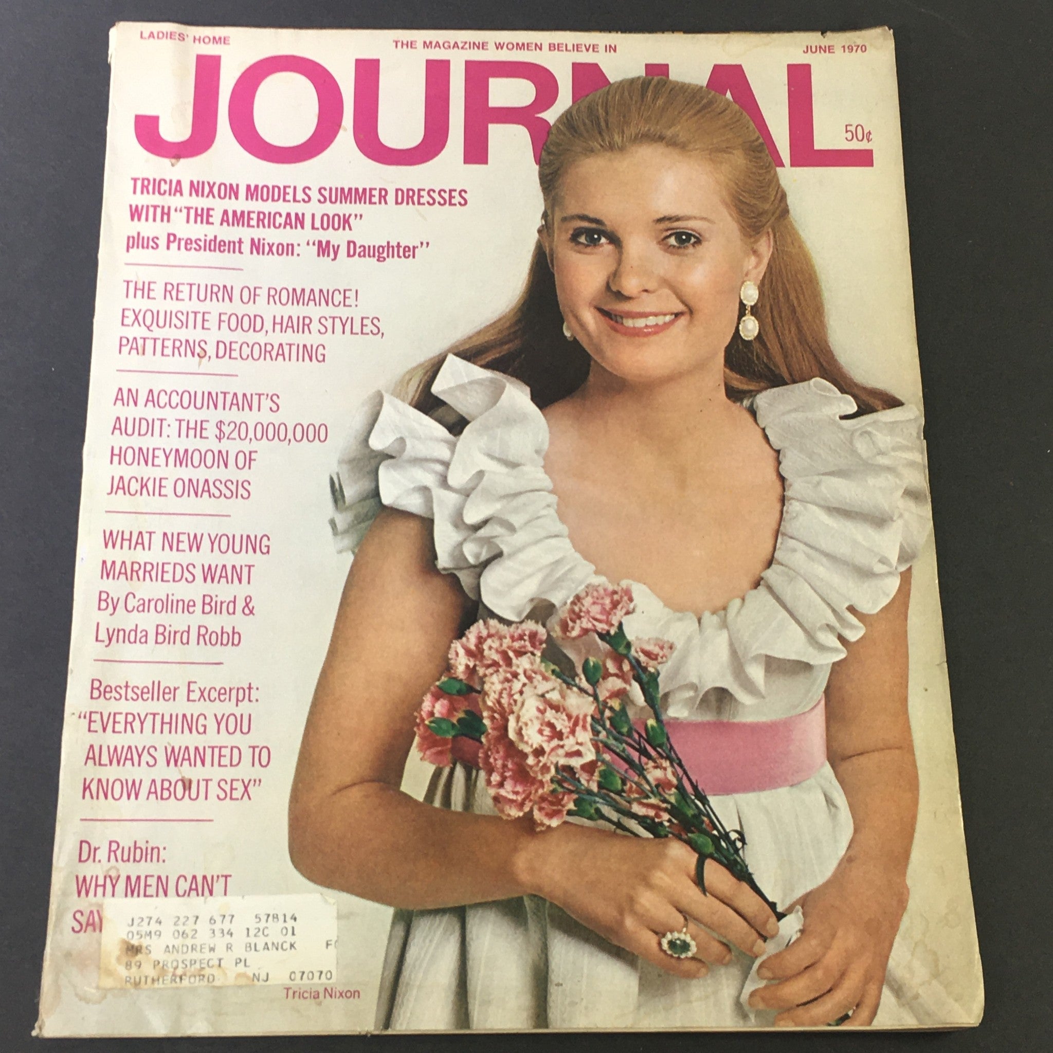 VTG Journal Magazine June 1970 cover featuring Tricia Nixon modeling summer dresses with flower bouquet, highlighting iconic figures of the era.