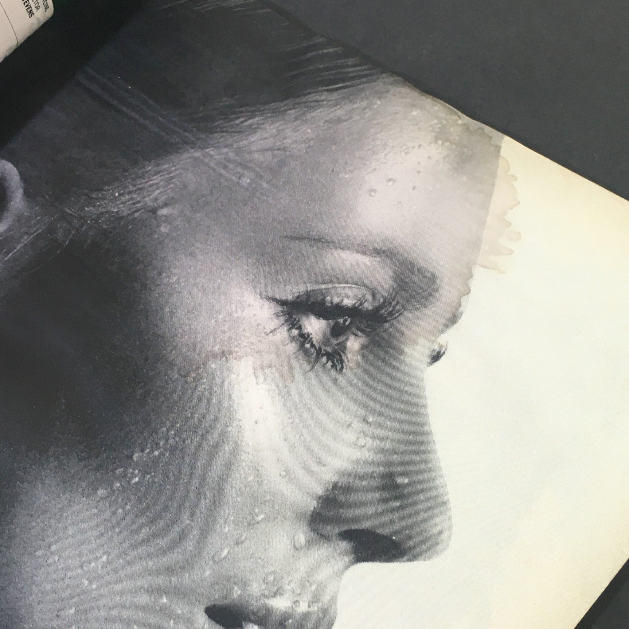 Interior page of VTG Journal Magazine November 1970 featuring a black and white image of a woman with water droplets, representative of the magazine's artistic style.