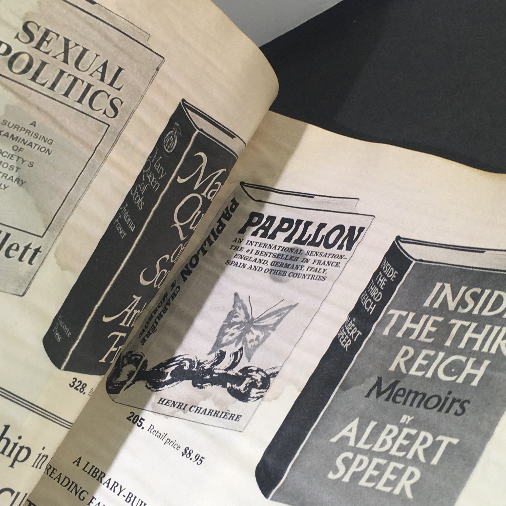 Interior page of the VTG Journal Magazine from November 1970, featuring advertisements for notable books including 'Papillon' by Henri Charrière and 'Inside the Third Reich' by Albert Speer, offering a glimpse into the literary trends of the era.