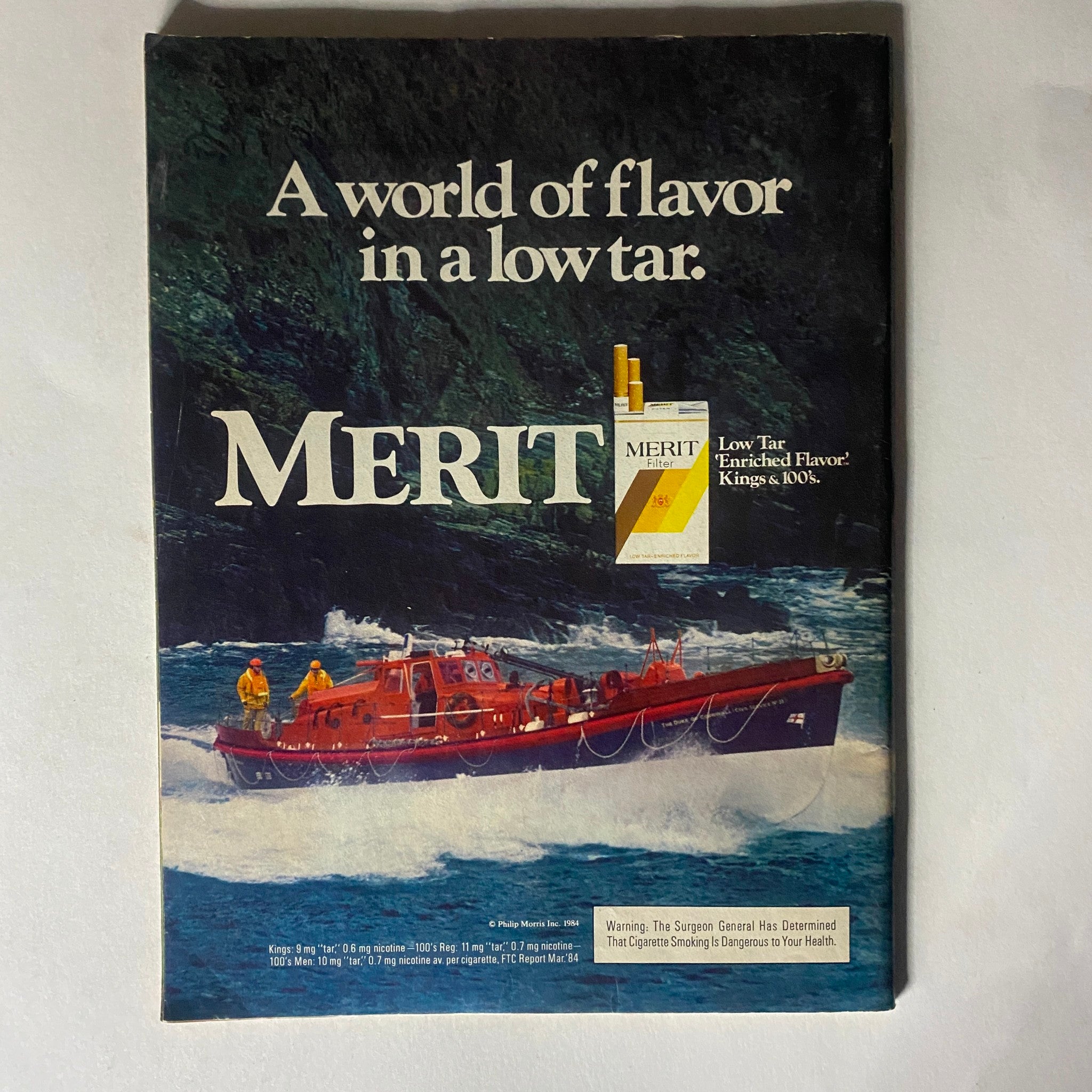 Back cover of VTG People Weekly Magazine September 3, 1984, featuring an advertisement for Merit cigarettes, highlighting low tar flavor.