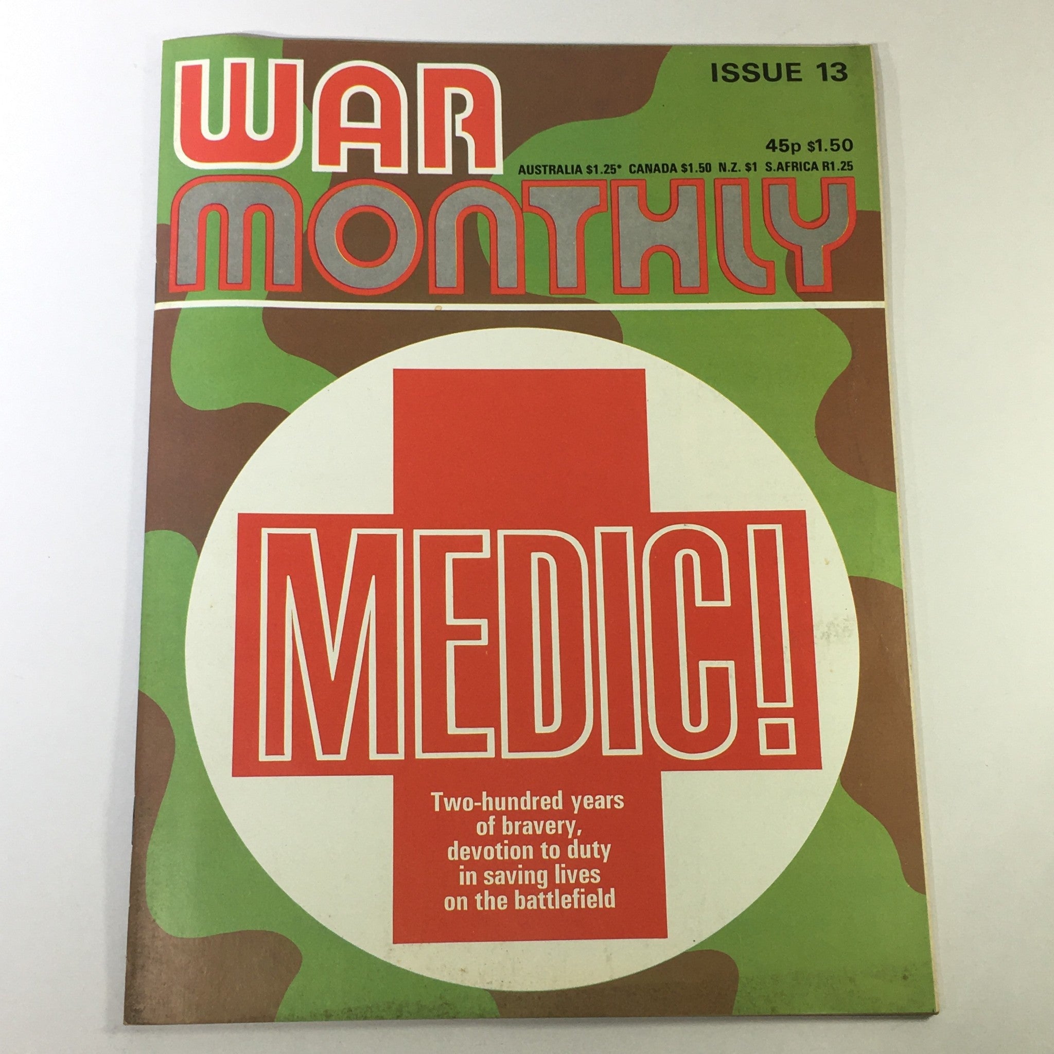 Cover of VTG War Monthly Magazine Issue 13 from April 1975, featuring bold lettering and a camouflage background, highlighting 'MEDIC!' and celebrating two hundred years of bravery in battlefield medical care.