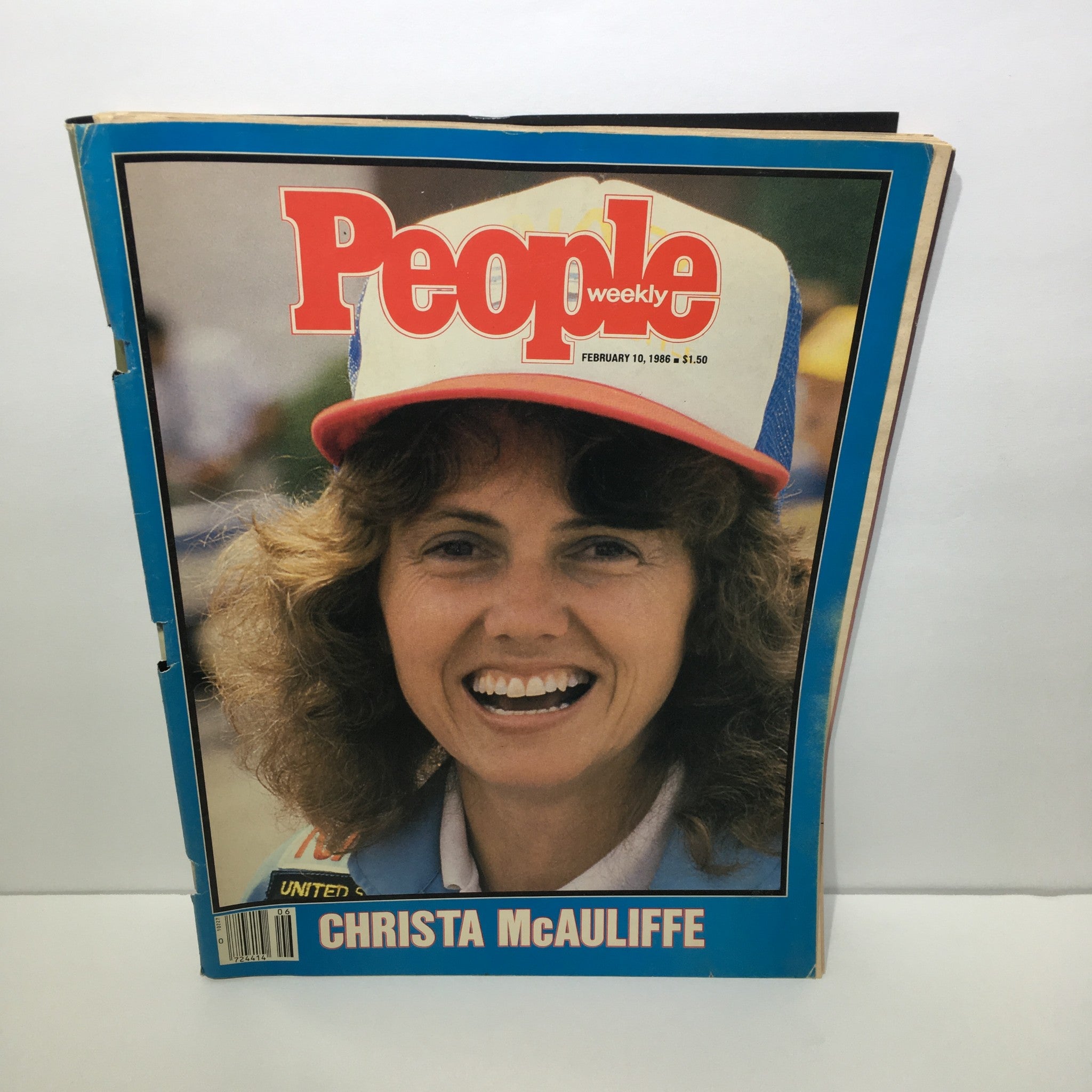 People Weekly Magazine featuring Christa McAuliffe on the cover, dated February 10, 1986. The cover showcases Christa McAuliffe smiling, wearing a cap, reflecting her role as a teacher and astronaut.