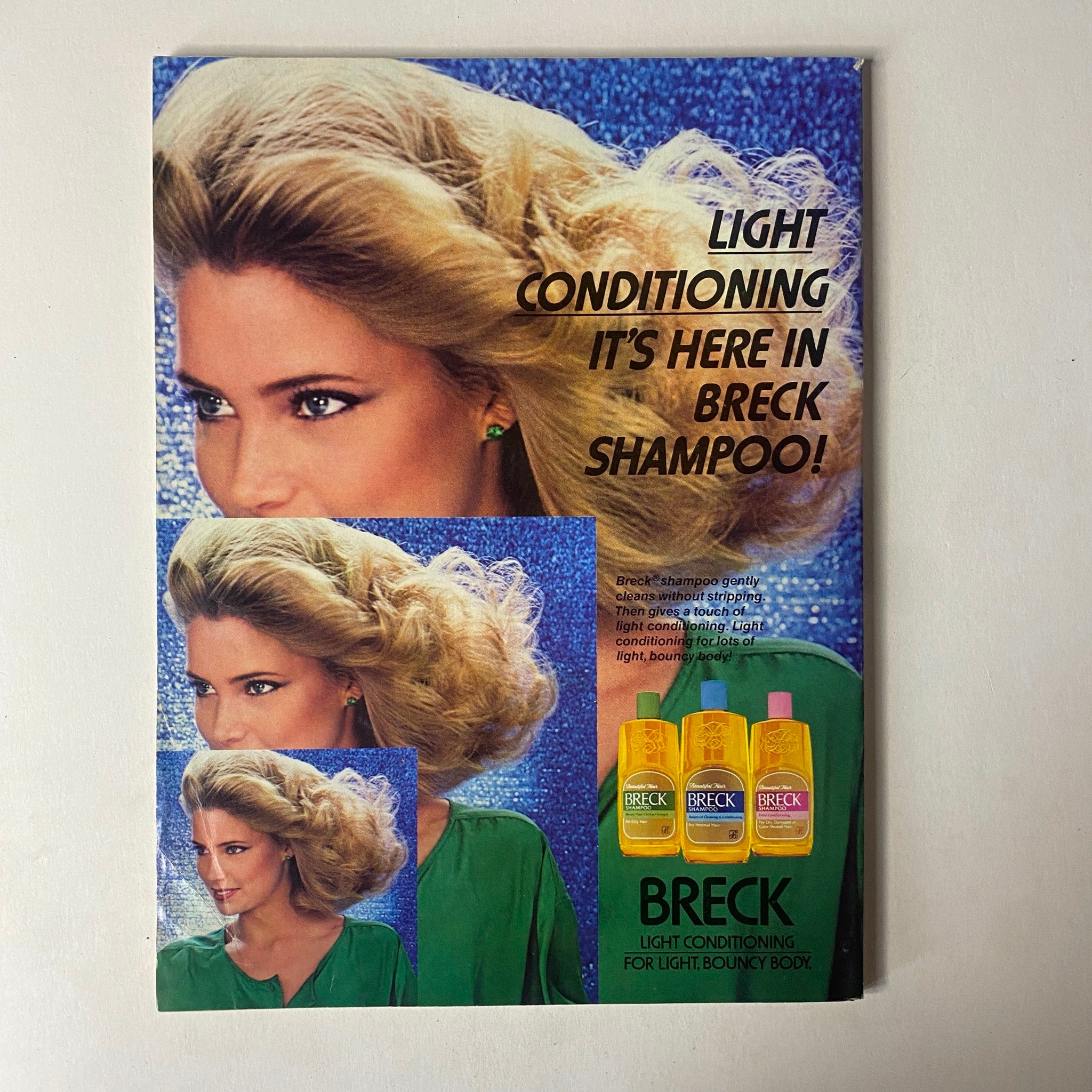 Advertisement in Seventeen Magazine July 1979 for Breck Shampoo, promoting light conditioning for bouncy hair with vibrant imagery of a model.