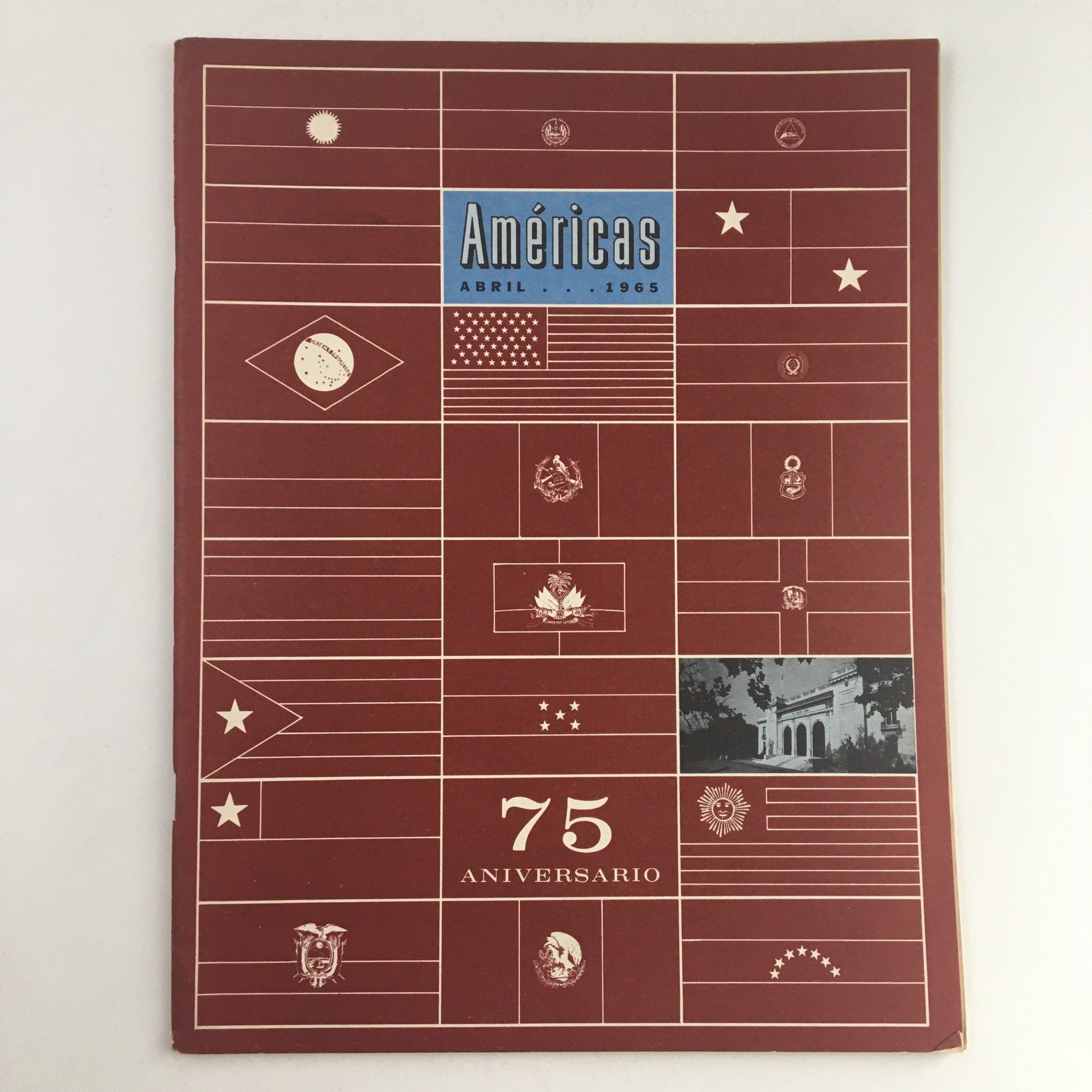 Cover of Americas Magazine April 1965 75th Anniversary Foundation featuring flag designs and commemorative elements.