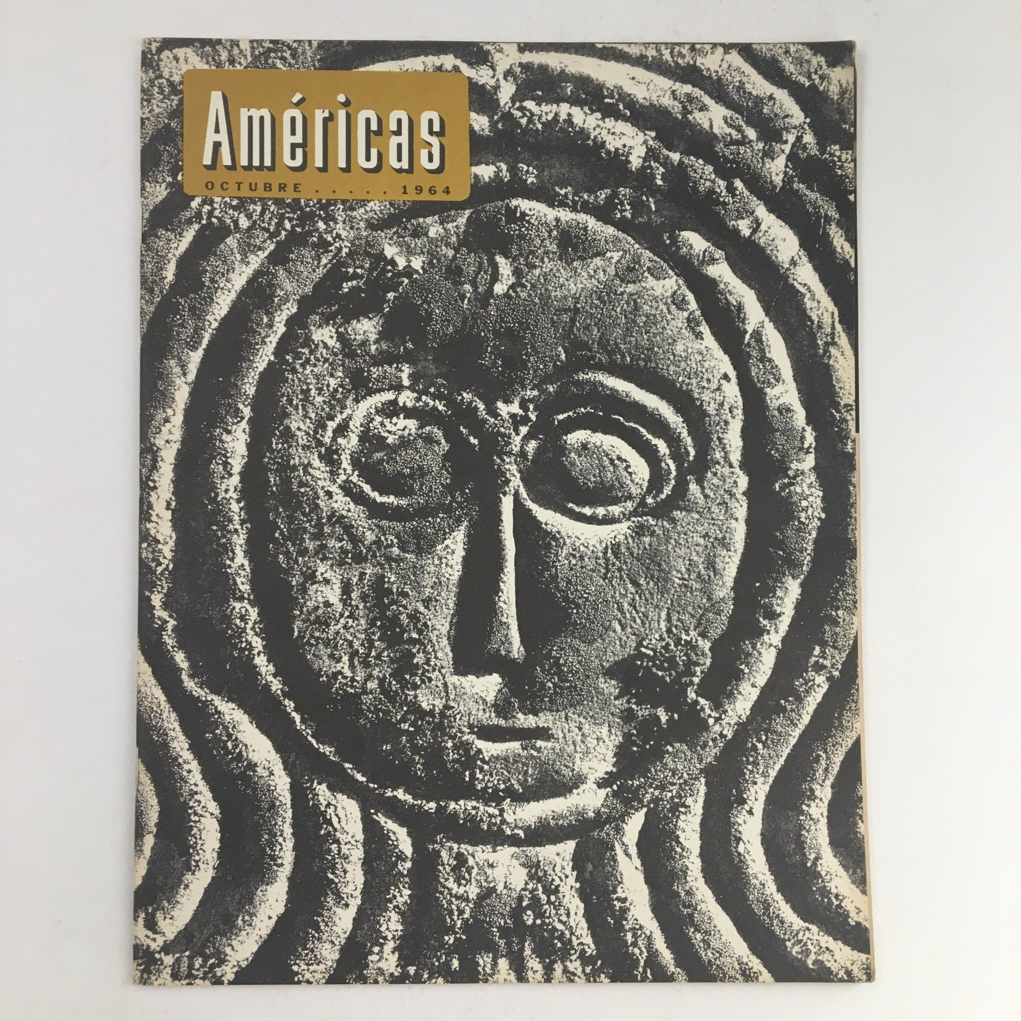 Cover of America's Magazine, October 1964, featuring an ancient artifact theme with a striking black and white design.