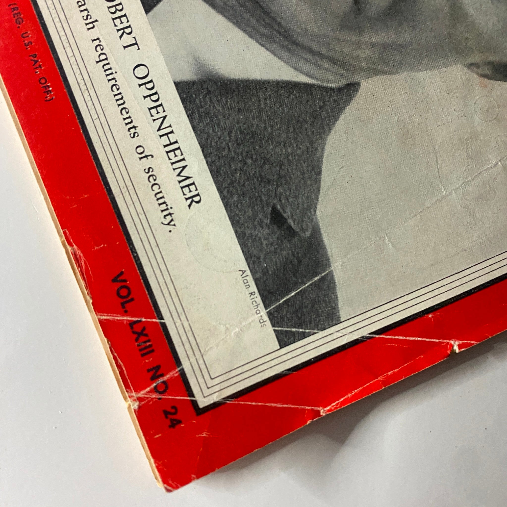Close-up of VTG Time Magazine June 14, 1954, featuring physicist J. Robert Oppenheimer cover, showing details of creases and wear.