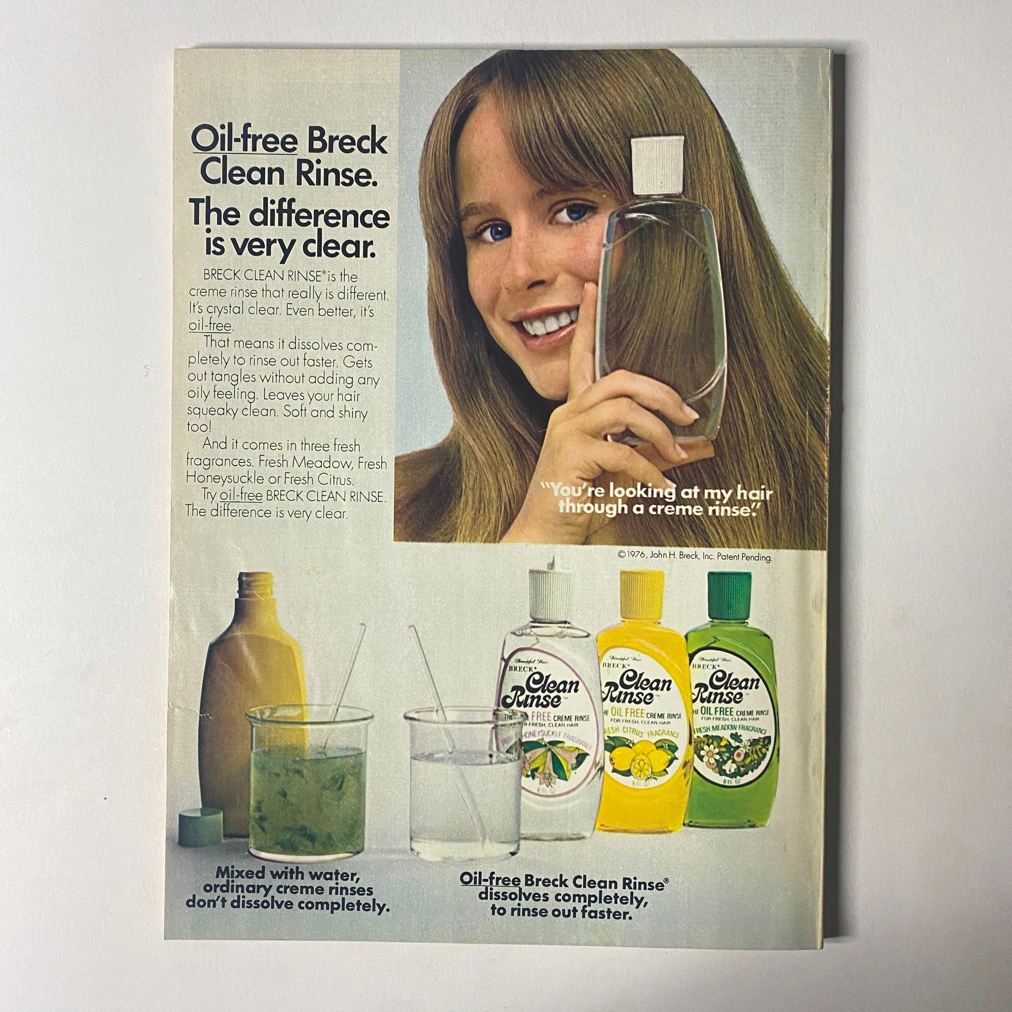 Ad for Breck Clean Rinse from Seventeen Magazine November 1976, promoting oil-free hair care with a fresh and clear theme, complementing the magazine's beauty section featuring Nadia Comăneci.