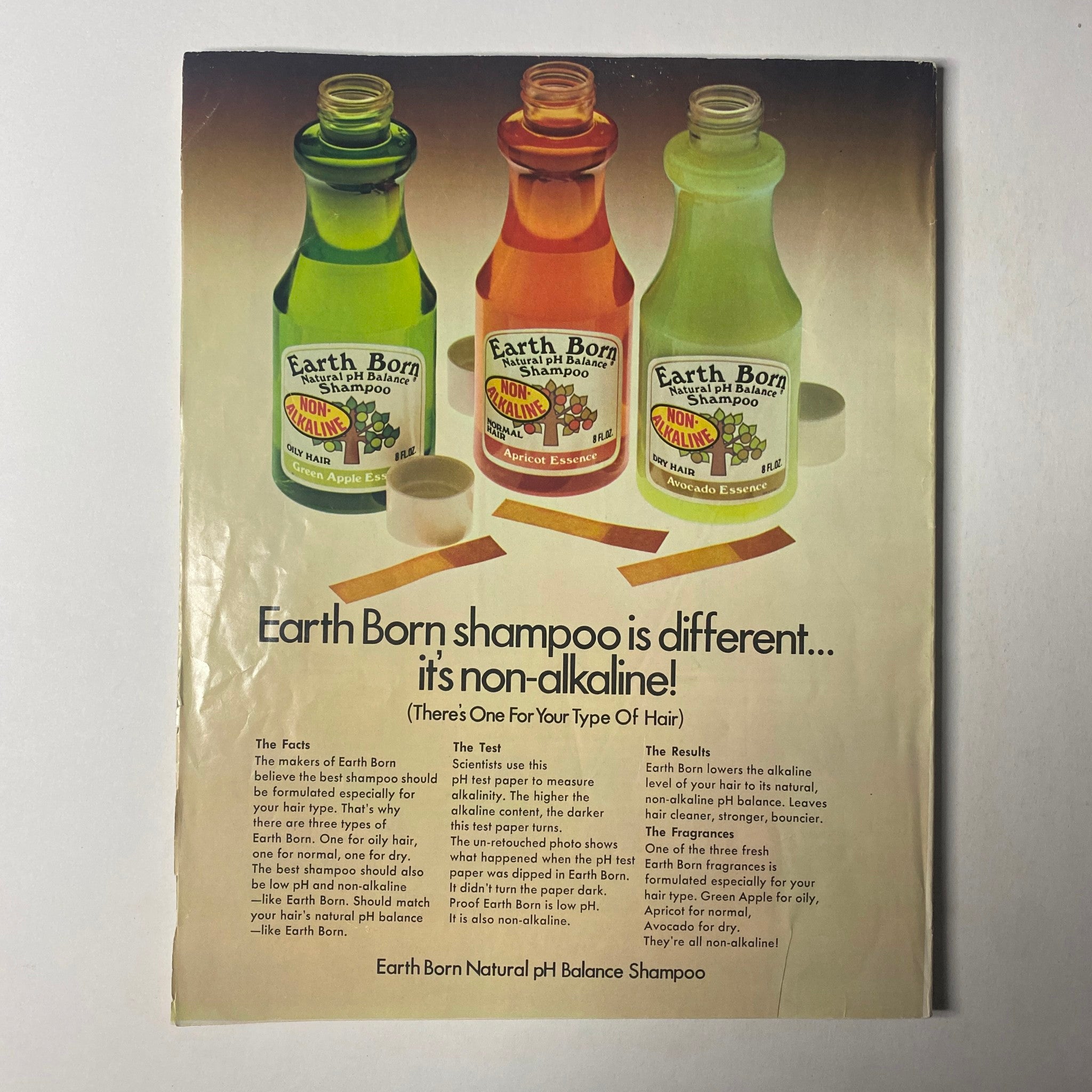 Advertisement for Earth Born shampoo, highlighting its non-alkaline formula, featured in Seventeen Magazine February 1975.