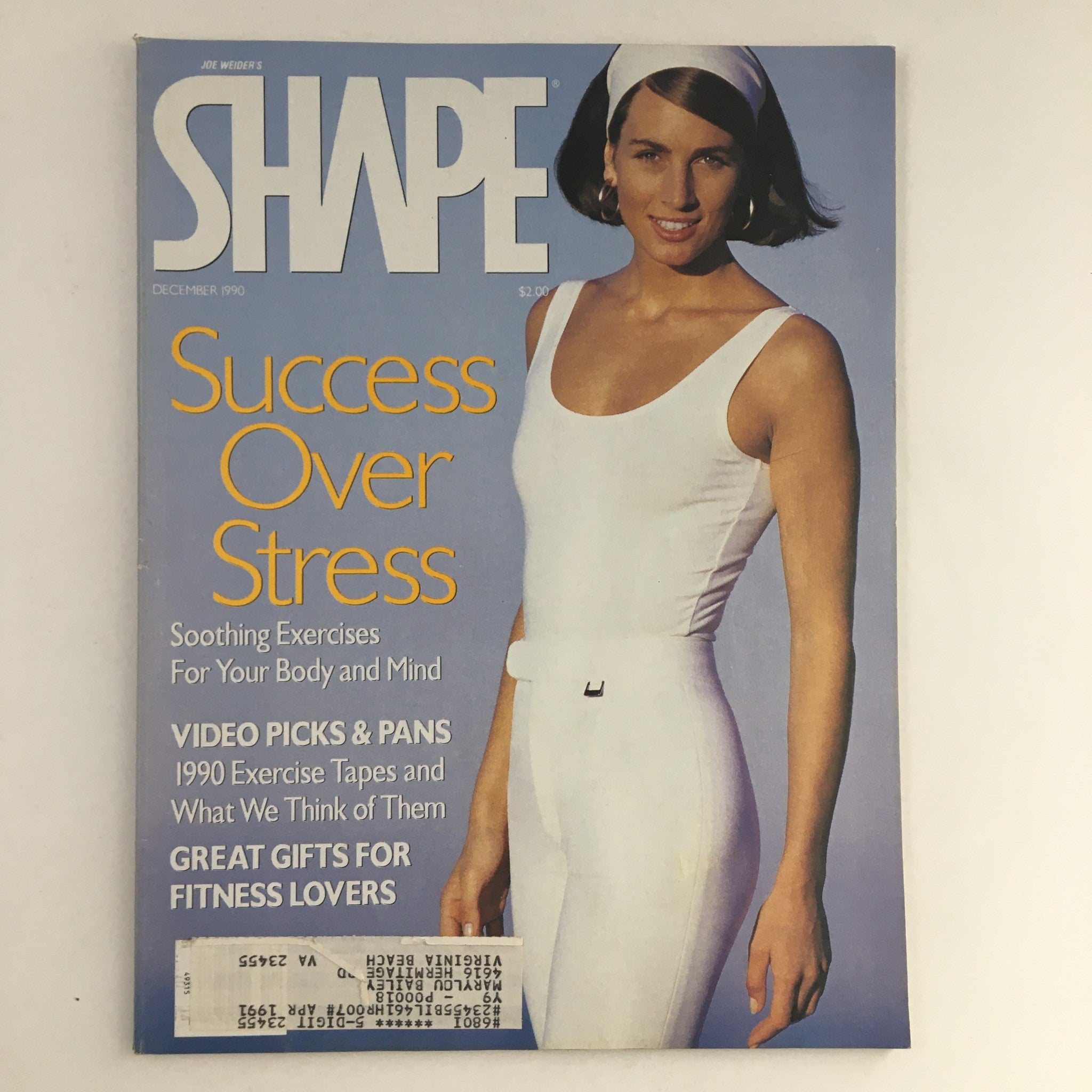 Cover of Shape Magazine December 1990 featuring the title 'Success Over Stress' with a model in a white outfit promoting soothing exercises for the body and mind.