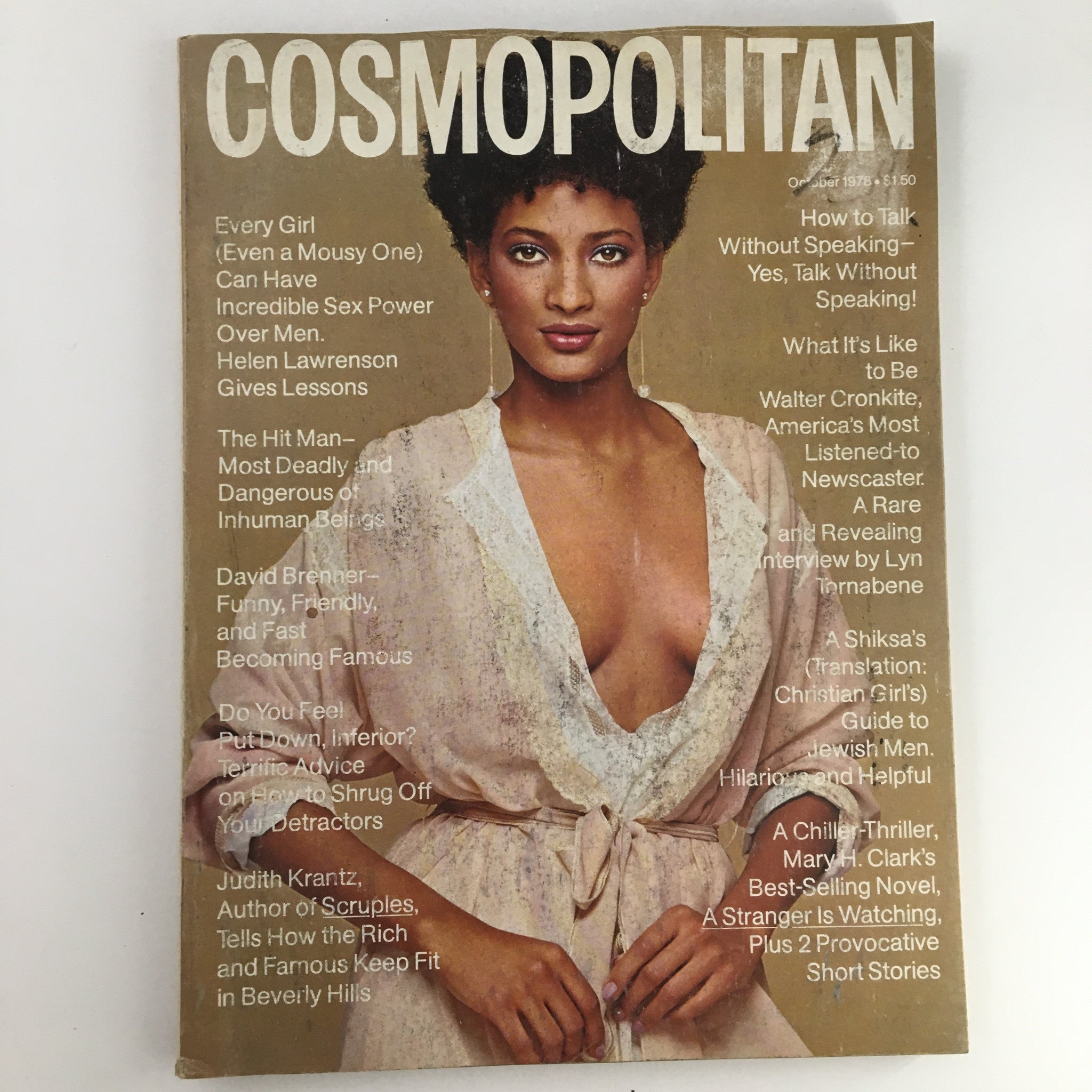 Cover of Cosmopolitan Magazine, October 1978 issue featuring a model in a stylish outfit. The title 'Cosmopolitan' is prominently displayed, along with highlights of featured articles by David Brenner and other topics. This vintage magazine cover encapsulates the fashion and cultural trends of the late 1970s.