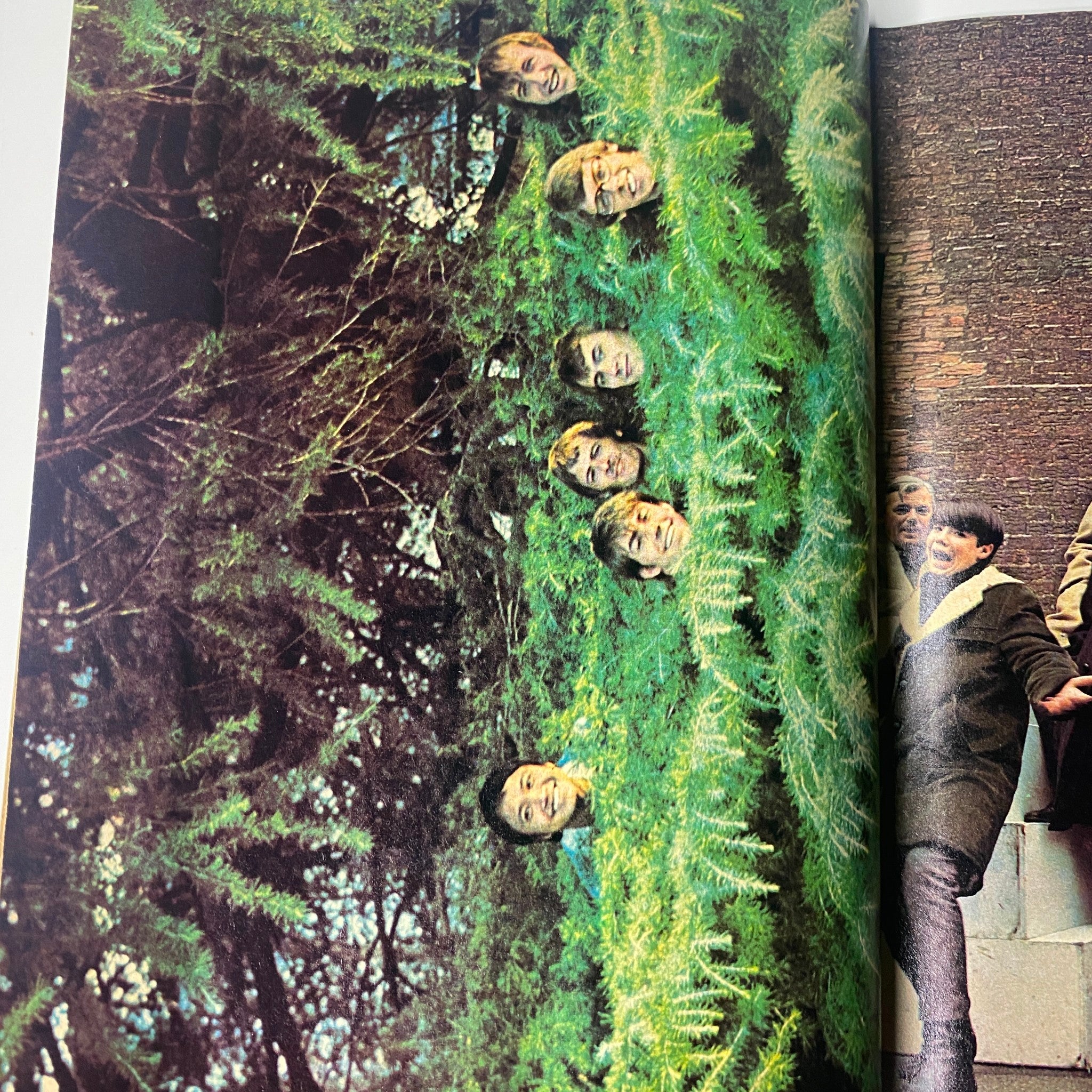 Colorful image of The Monkees featured in Teen Screen Magazine August 1968, showcasing a playful and iconic moment in music history.