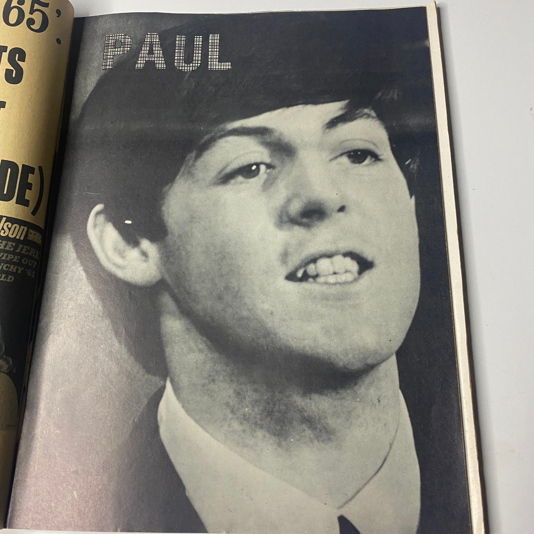 Black and white image of Paul McCartney featured in Teen Screen Magazine March 1965, symbolizing Beatlemania.