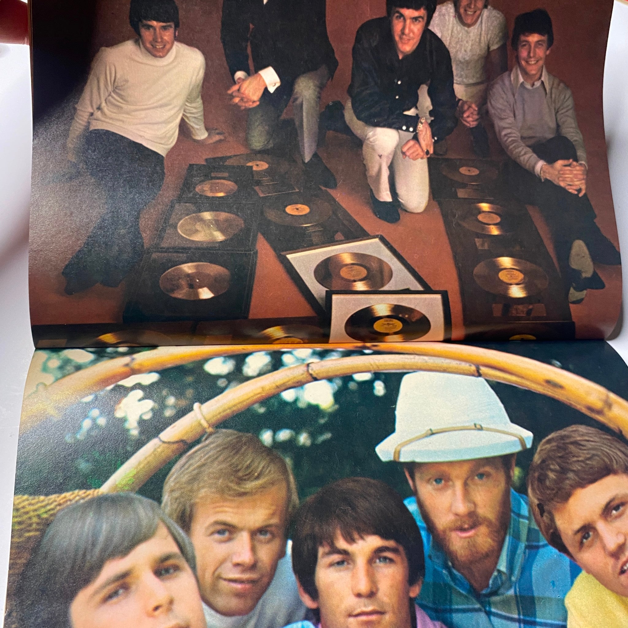 Group photo of The Monkees with gold records and other artists, from Teen Screen Magazine April 1967.