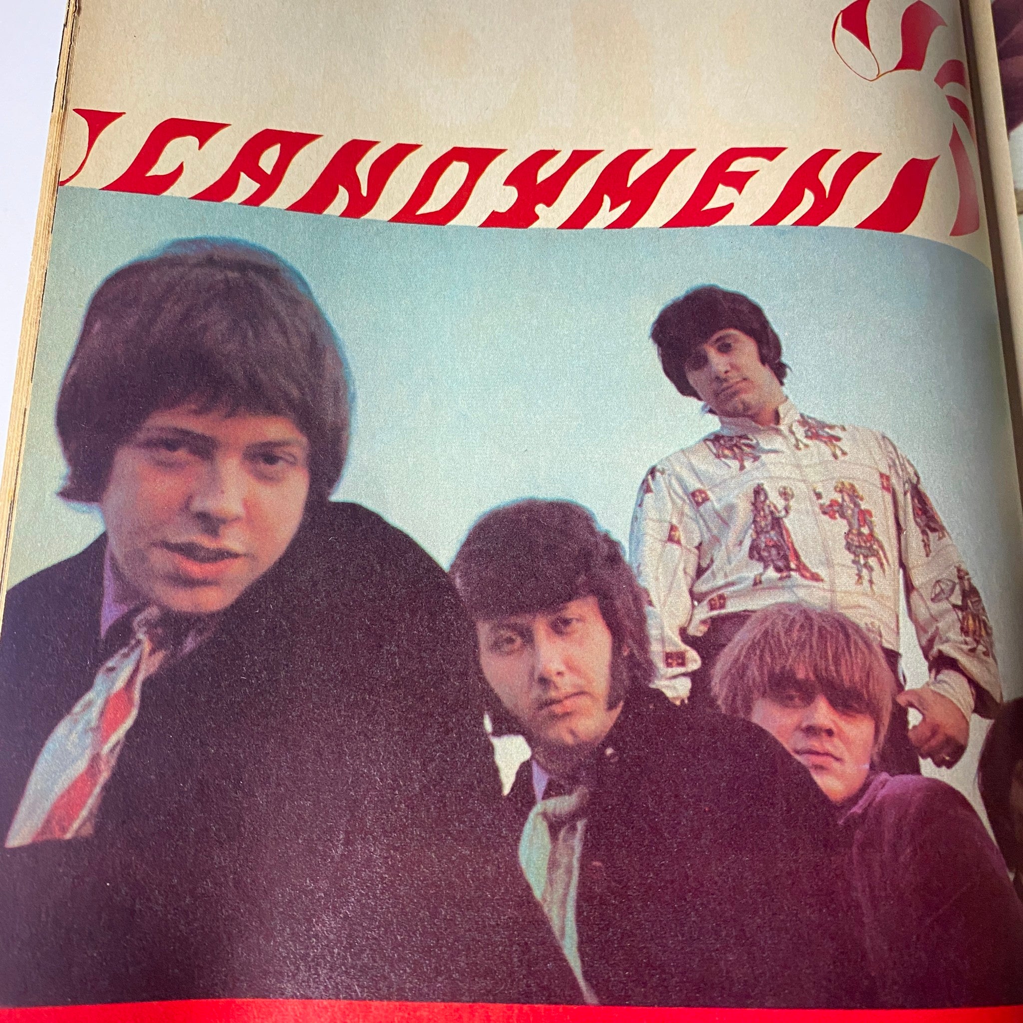 The band Candymen featured in an artistic photograph from Teen Screen Magazine February 1968, portraying the vibrant music culture of the late 1960s.