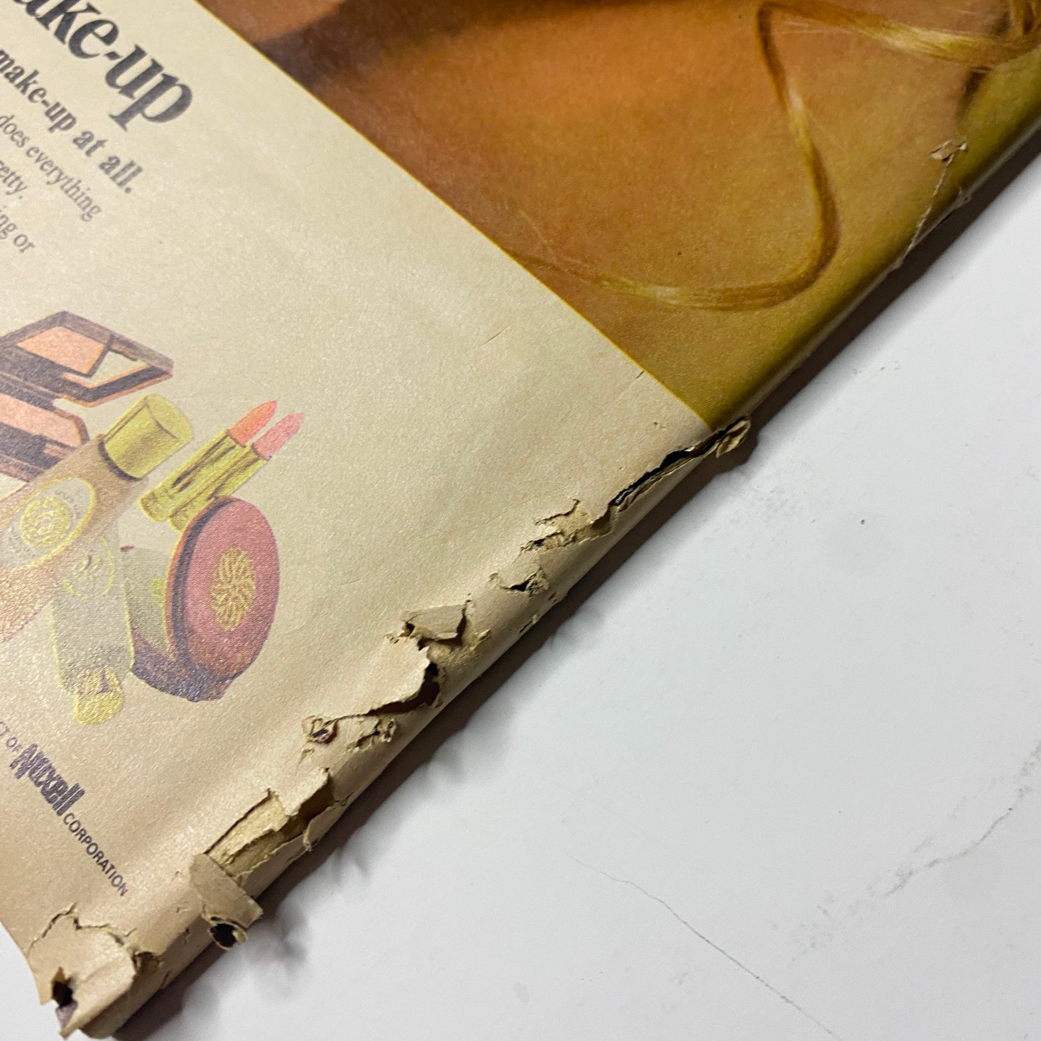 TeenSet Magazine 1968 The Beatles Special - A close-up view of the magazine's edge, displaying wear and tear along the cover, indicative of its vintage condition.