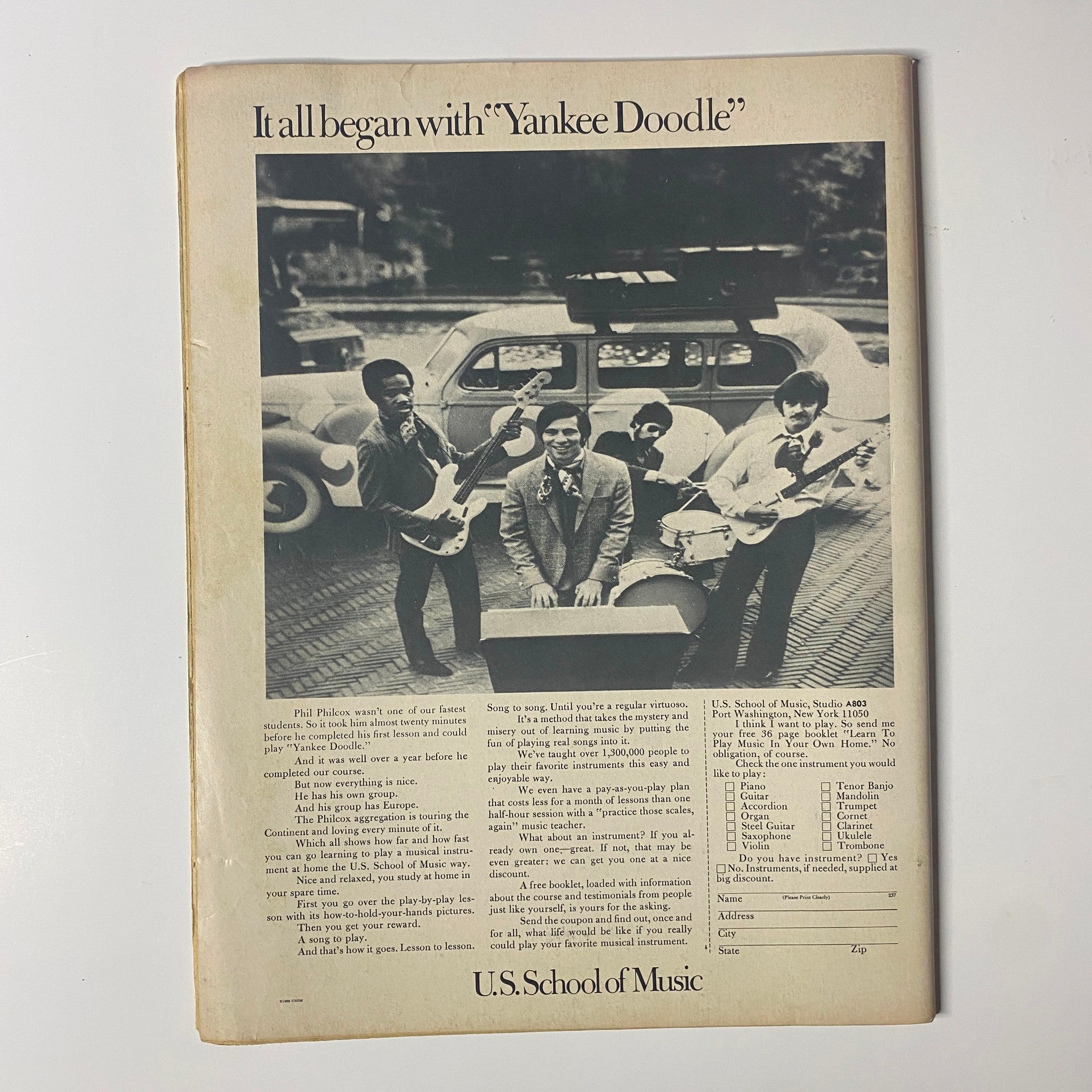 Back cover of Datebook Magazine, March 1969, featuring an advertisement for U.S. School of Music and a vintage photograph of musicians, reflecting the era's cultural landscape.