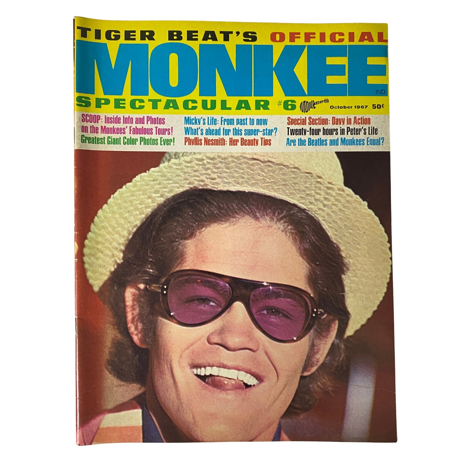 Tiger Beat's Official October 1967 #6 Monkee Spectacular magazine cover featuring a smiling young man in sunglasses and a hat.