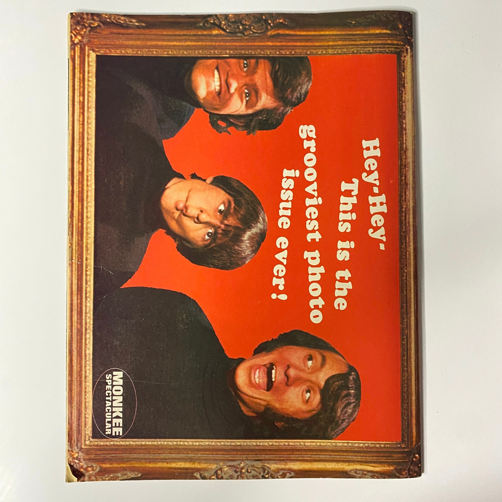 Back cover of Tiger Beat's Official October 1967 #6 Monkee Spectacular with three Monkees members posing and the message 'Hey, Hey - This is the grooviest photo issue ever!'.