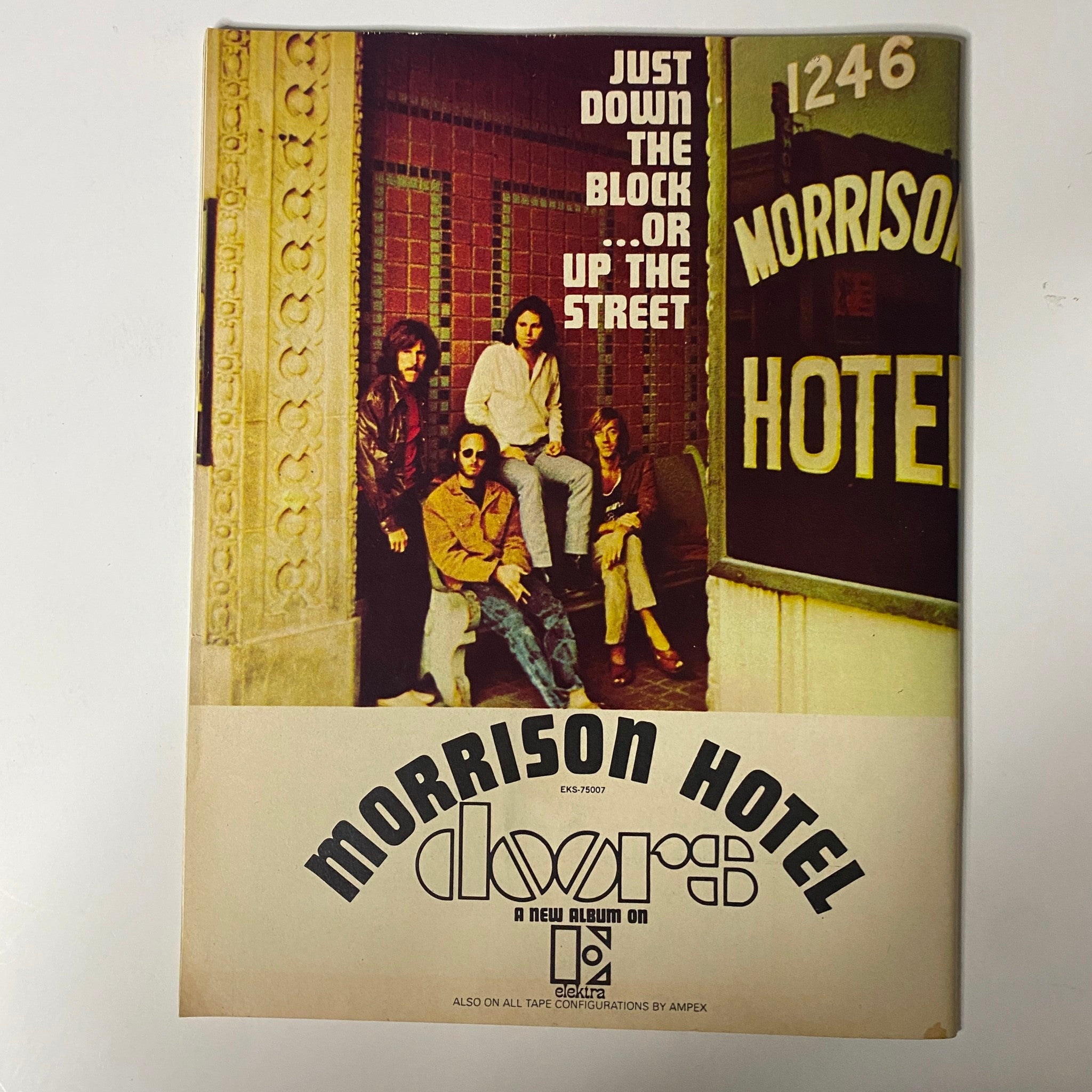 Additional promotional material featuring the Morrison Hotel, showing a group of musicians, related to the 1970 The Rolling Stones Discover America magazine, emphasizing iconic rock culture.