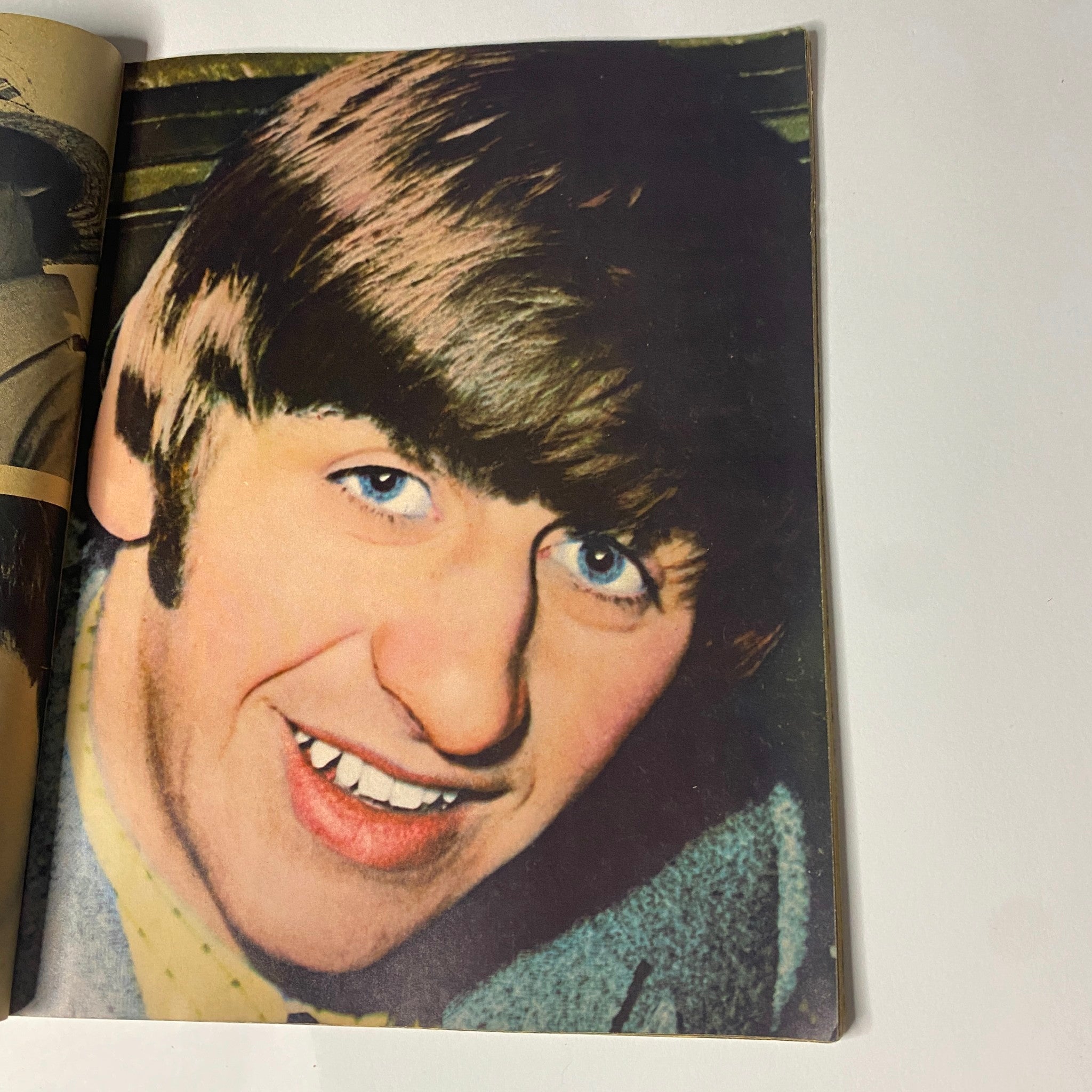 Image of Ringo Starr from the 1965 16 Scoop: Beatles Complete Story from Birth to Now, highlighting the band's charismatic personality.