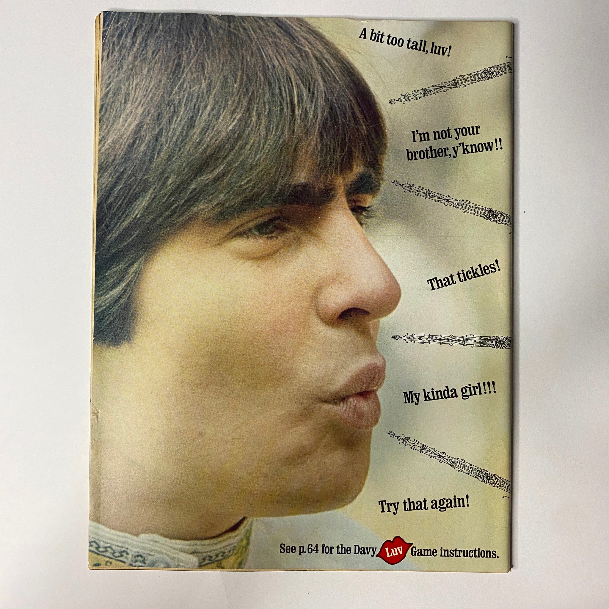 Cover image of Outasite Magazine March 1968 featuring a close-up of a young man with dark hair and a playful expression, showcasing quotes like 'My kinda girl!!!' and 'That tickles!' relevant to Davy Jones from The Monkees, highlighting the vibrant pop culture of the 1960s.