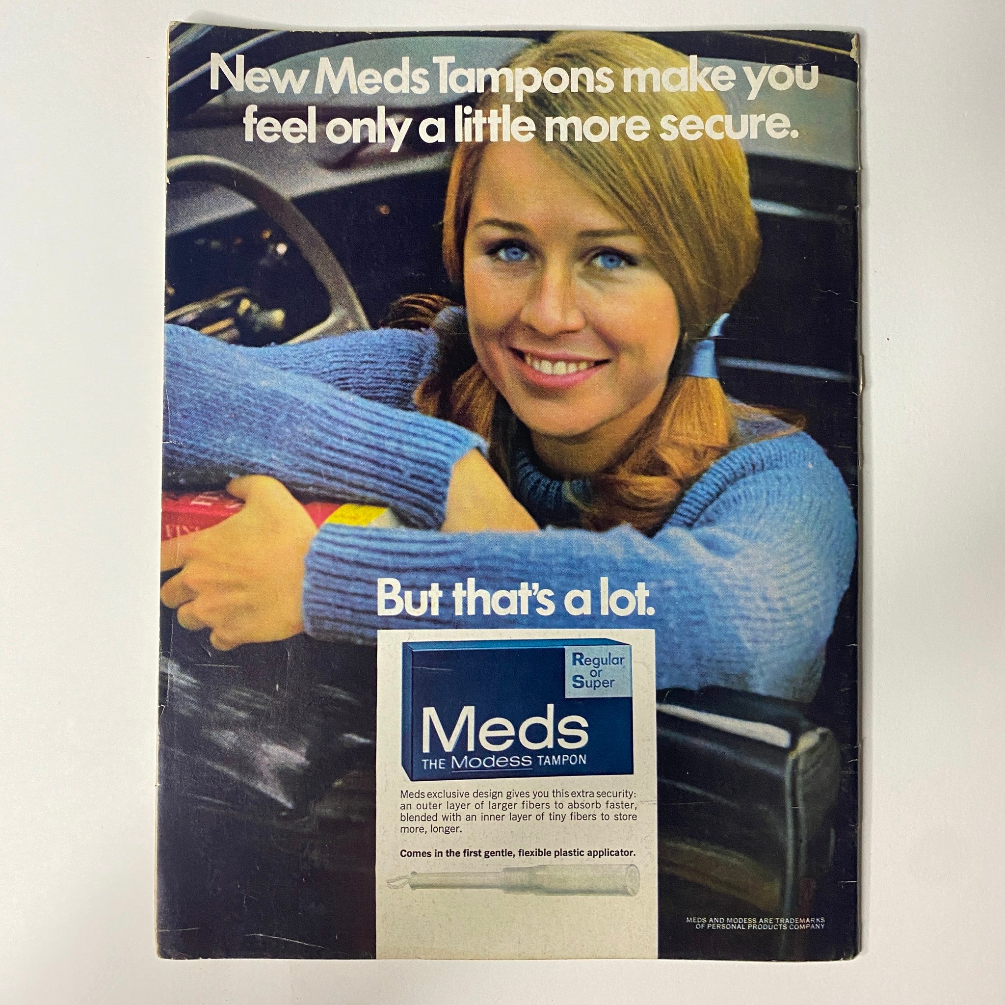Advertisement from In Magazine, July 1967, for Meds Tampons, featuring a young woman promoting the product with the tagline about feeling secure.