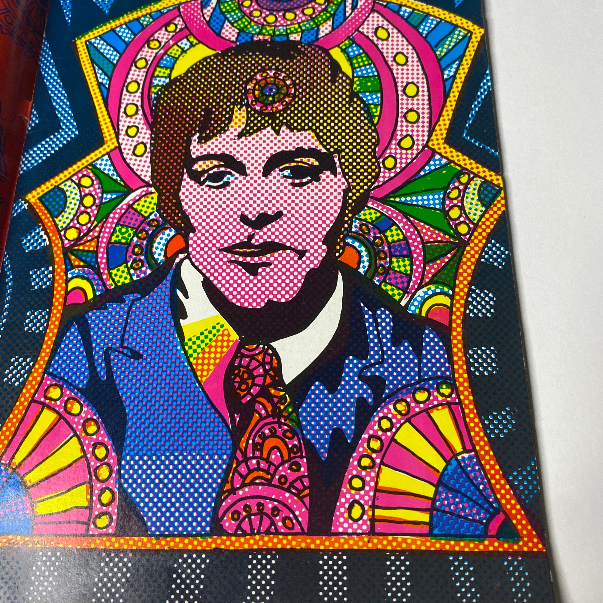 Hullabaloo Magazine July 1968 Vol 3 No. 5 psychedelic portrait of a male figure, enhancing the magazine's vibrant theme and artistic style.