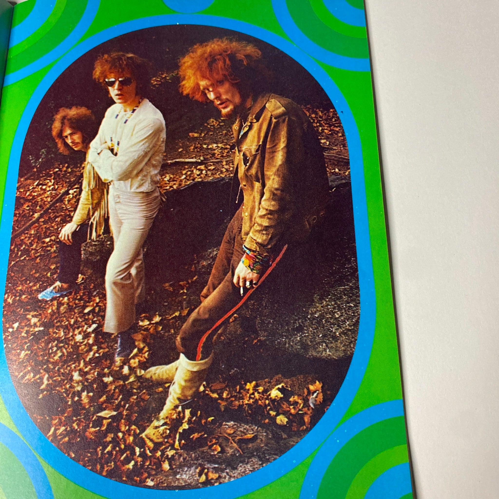 A featured photo from Hullabaloo Magazine October 1968 Vol 3 No. 8 showcases three musicians in a colorful psychedelic setting, reflecting the era's vibrant rock culture with The Cream's iconic presence.