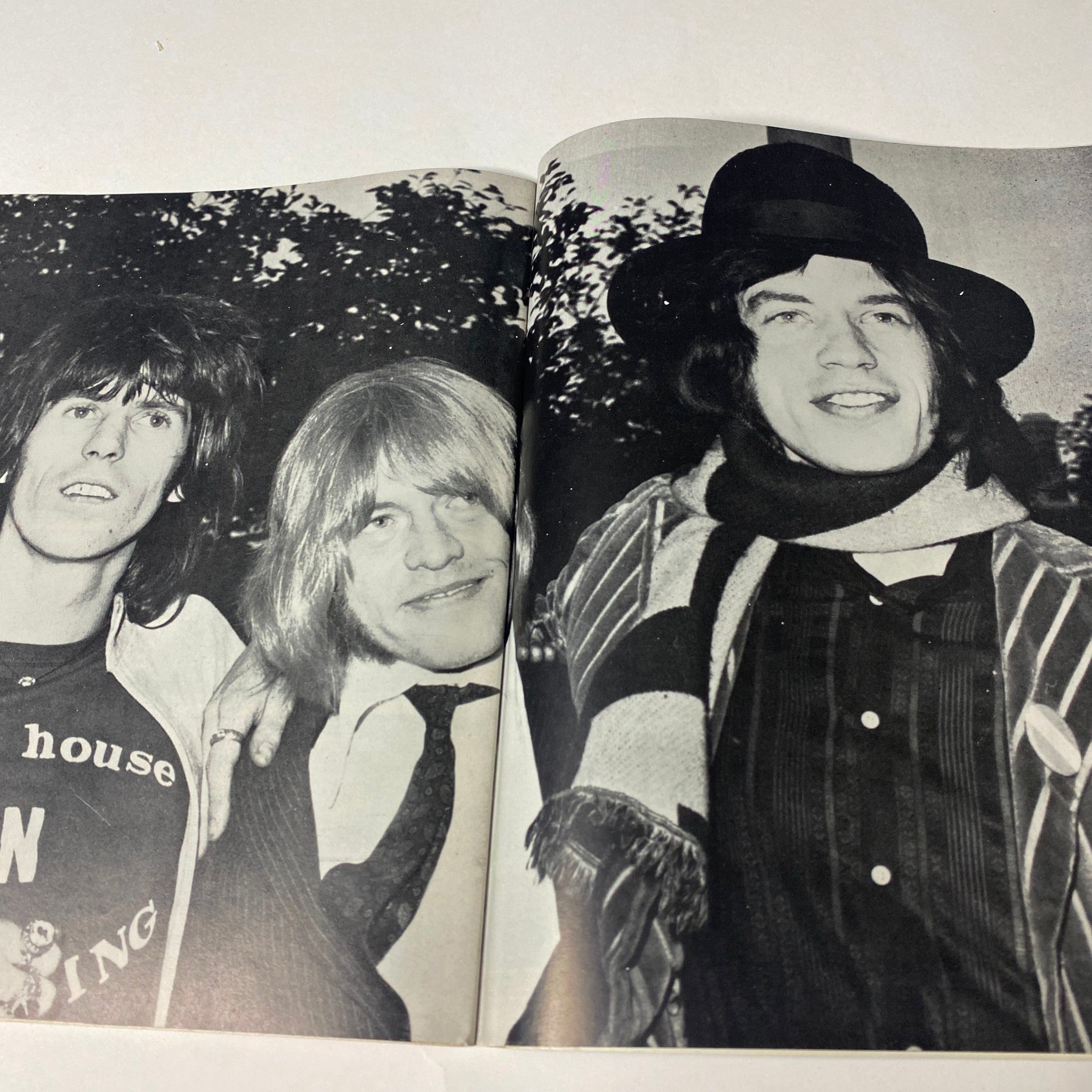 An interior photo spread from Hullabaloo Magazine February 1969 Vol 4 No. 5 showcasing prominent rock musicians posing together, symbolizing the iconic music scene of the late 1960s.