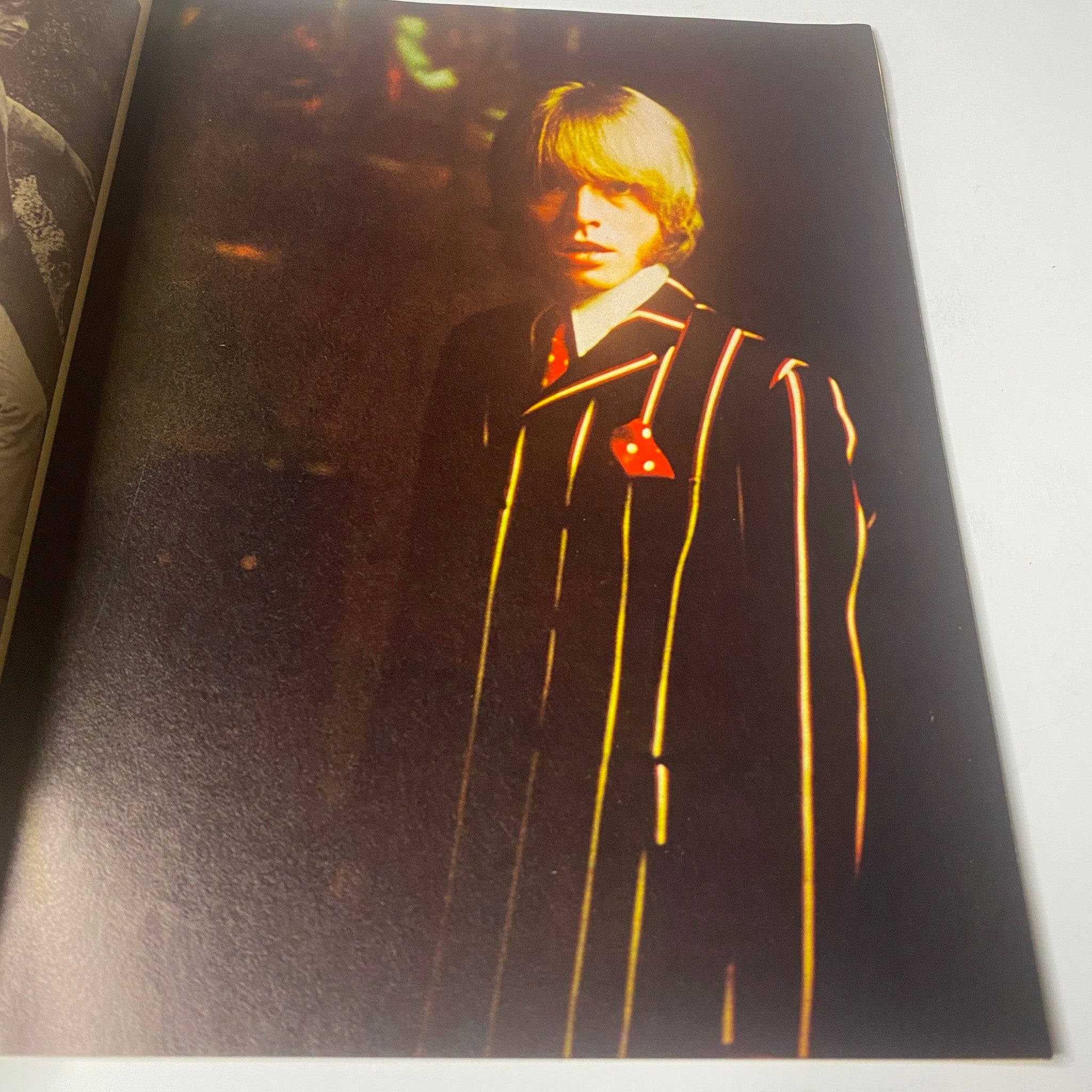 Page from Teen Set Magazine April 1967 featuring a young male figure in a vintage striped suit, capturing the era's fashion trends.