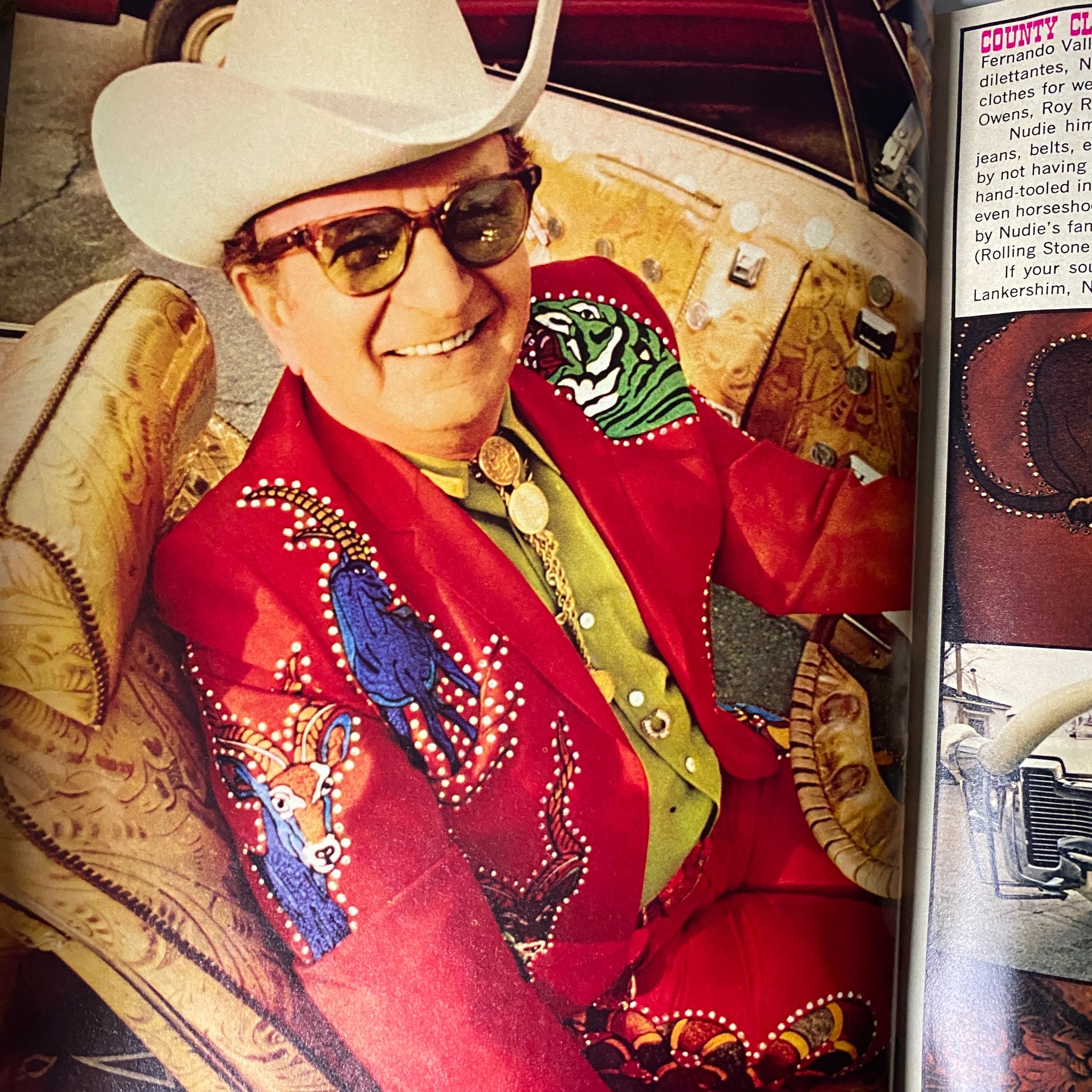 TeenSet Magazine March 1969 Vol 5 No. 3 Jimi Hendrix w Pin-up No Label featuring a man in a flamboyant red suit with colorful designs, seated in a vintage car, capturing the vibrant fashion of the late 1960s.