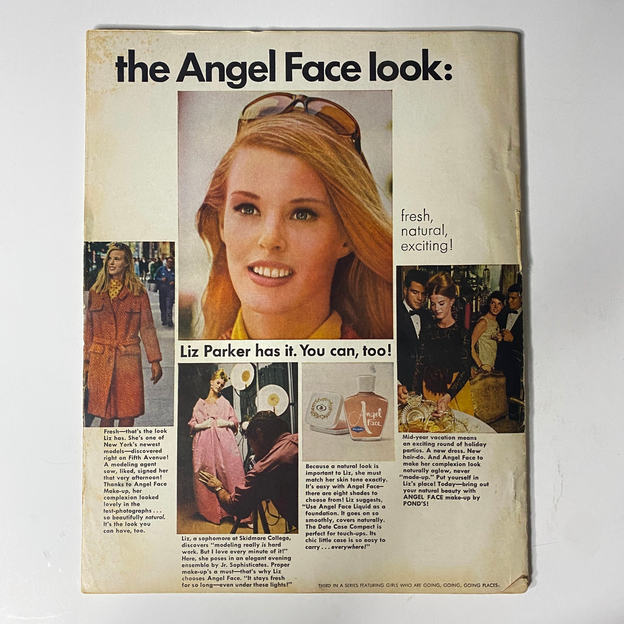 Back cover of Modern Screen Magazine December 1964 featuring an advertisement for the 'Angel Face look' with an image of a model promoting fashion and beauty.