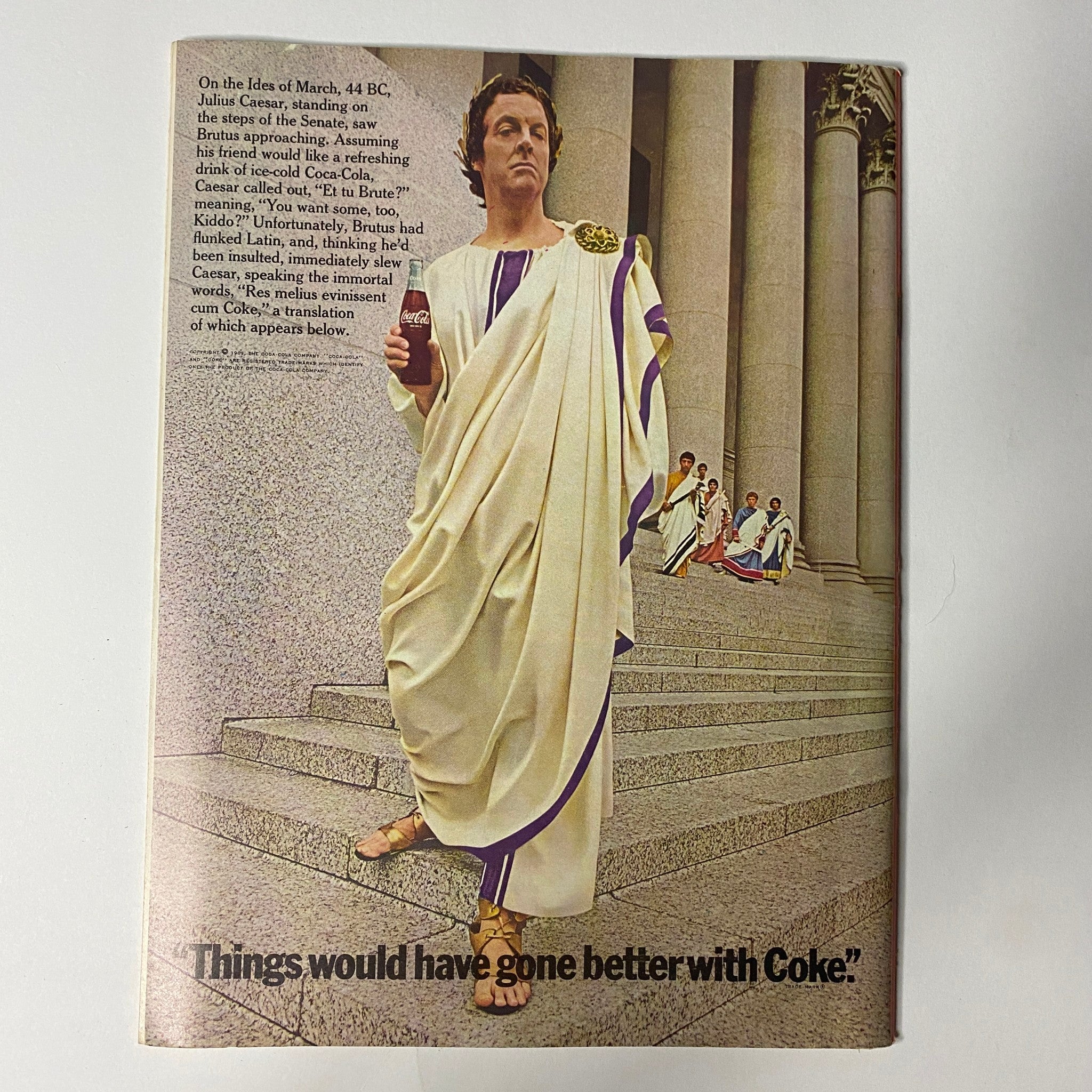 Humorous advertisement from Circus Magazine March 1969 depicting a Roman figure with the quote, 'Things would have gone better with Coke,' showcasing the magazine's blend of entertainment and culture.