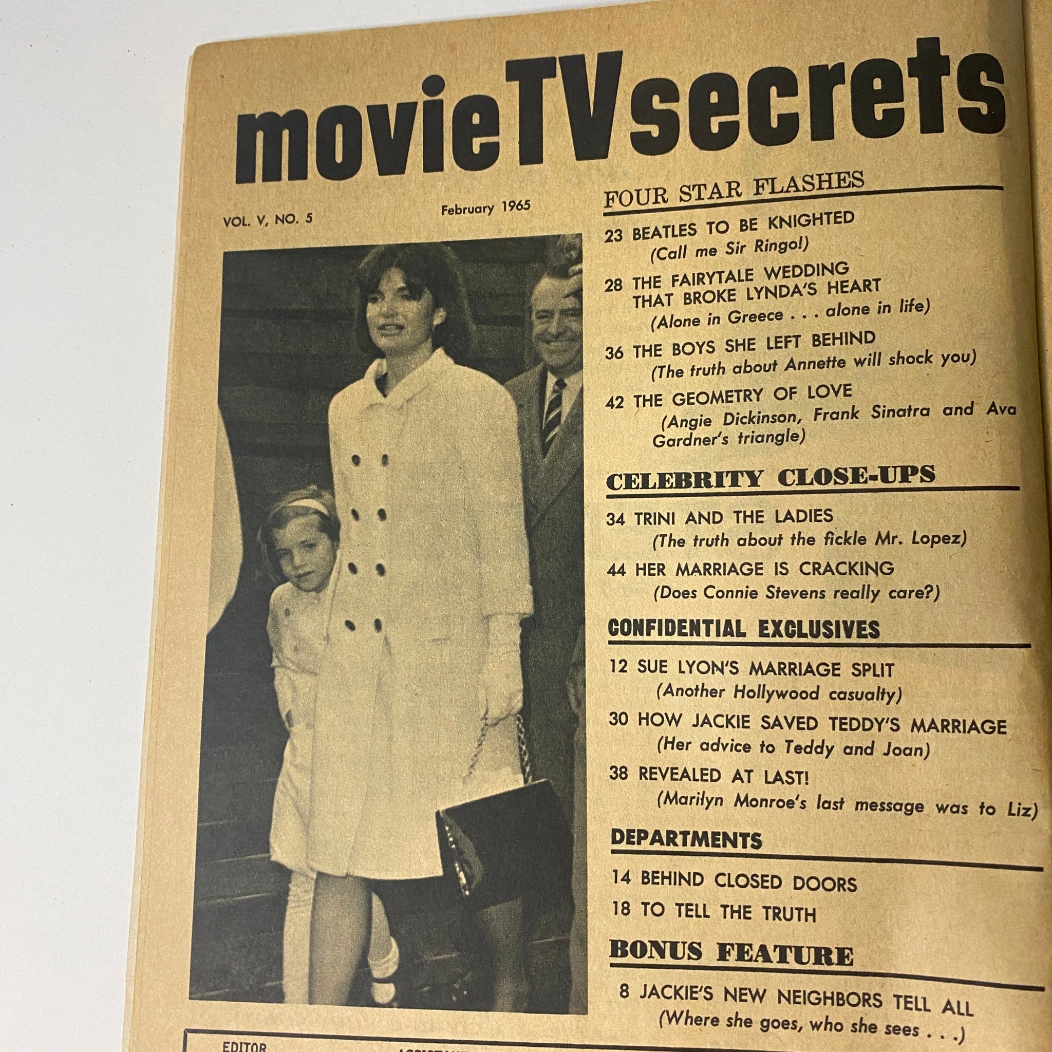Inside page of Movie TV Secrets Magazine, February 1965, showcasing contents including celebrity gossip about the Beatles and Lynda's Heartbreak, along with a photo of a stylish woman and child.