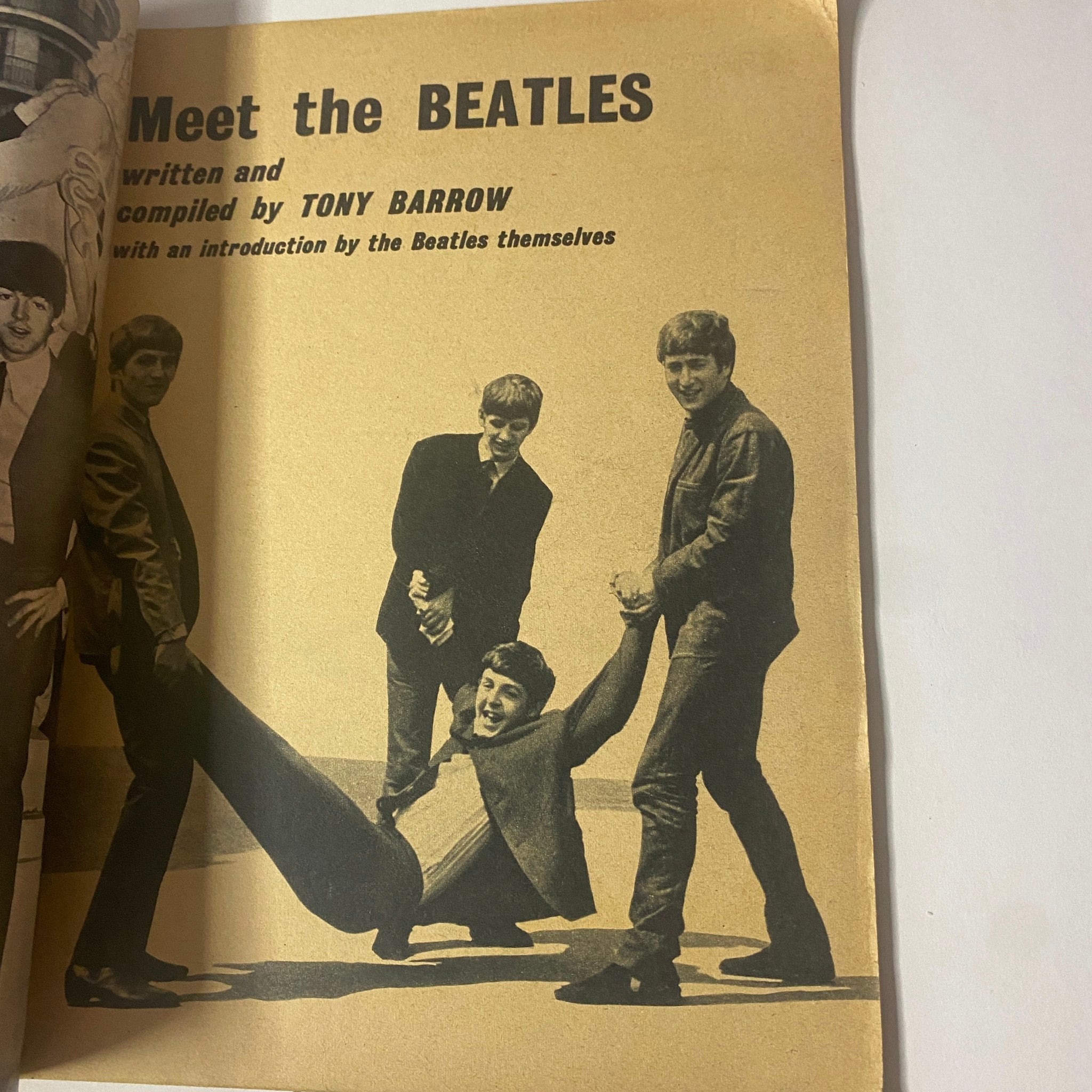1963 Meet The Beatles Photos From Their Personal Album - The Beatles posing playfully together, showcasing their early camaraderie.