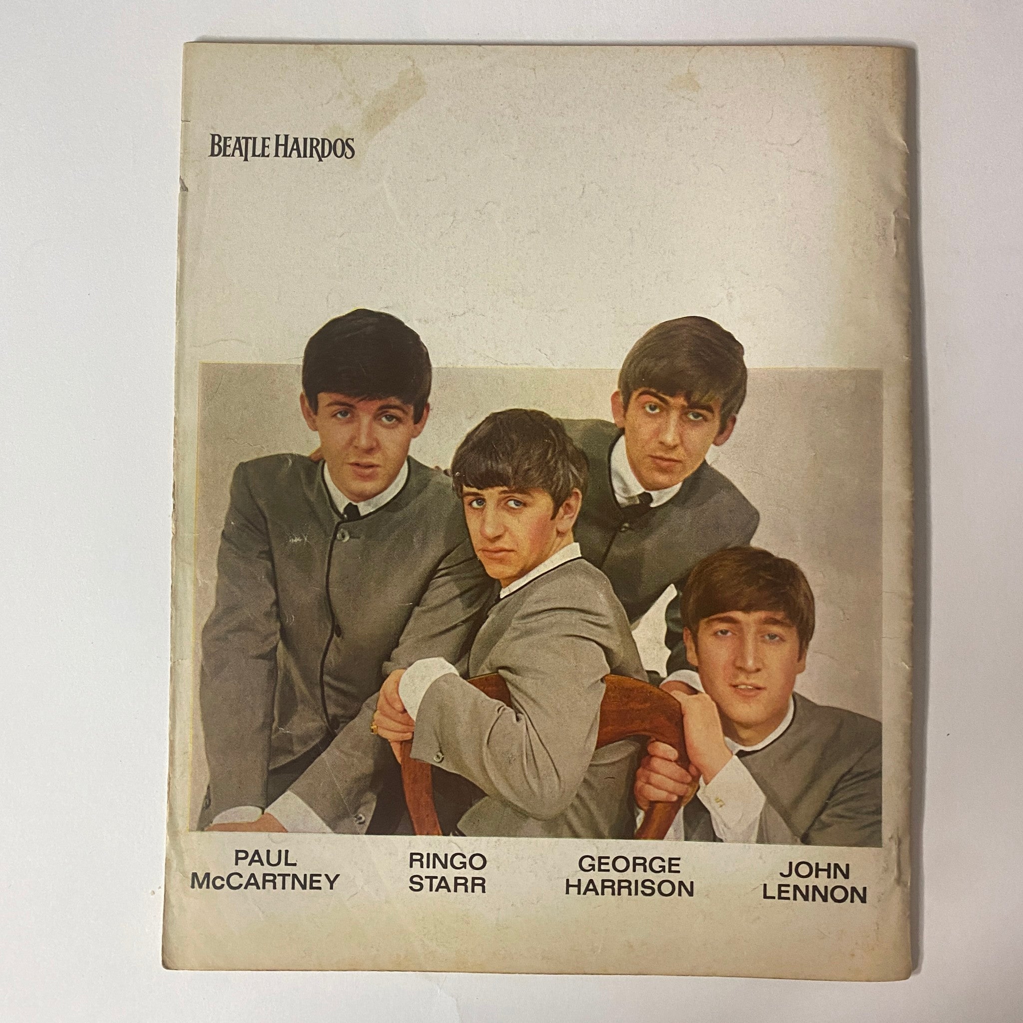 1964 Beatle Hairdos and Setting Patterns cover, featuring a classic photograph of The Beatles—Paul McCartney, Ringo Starr, George Harrison, and John Lennon in stylish suits.