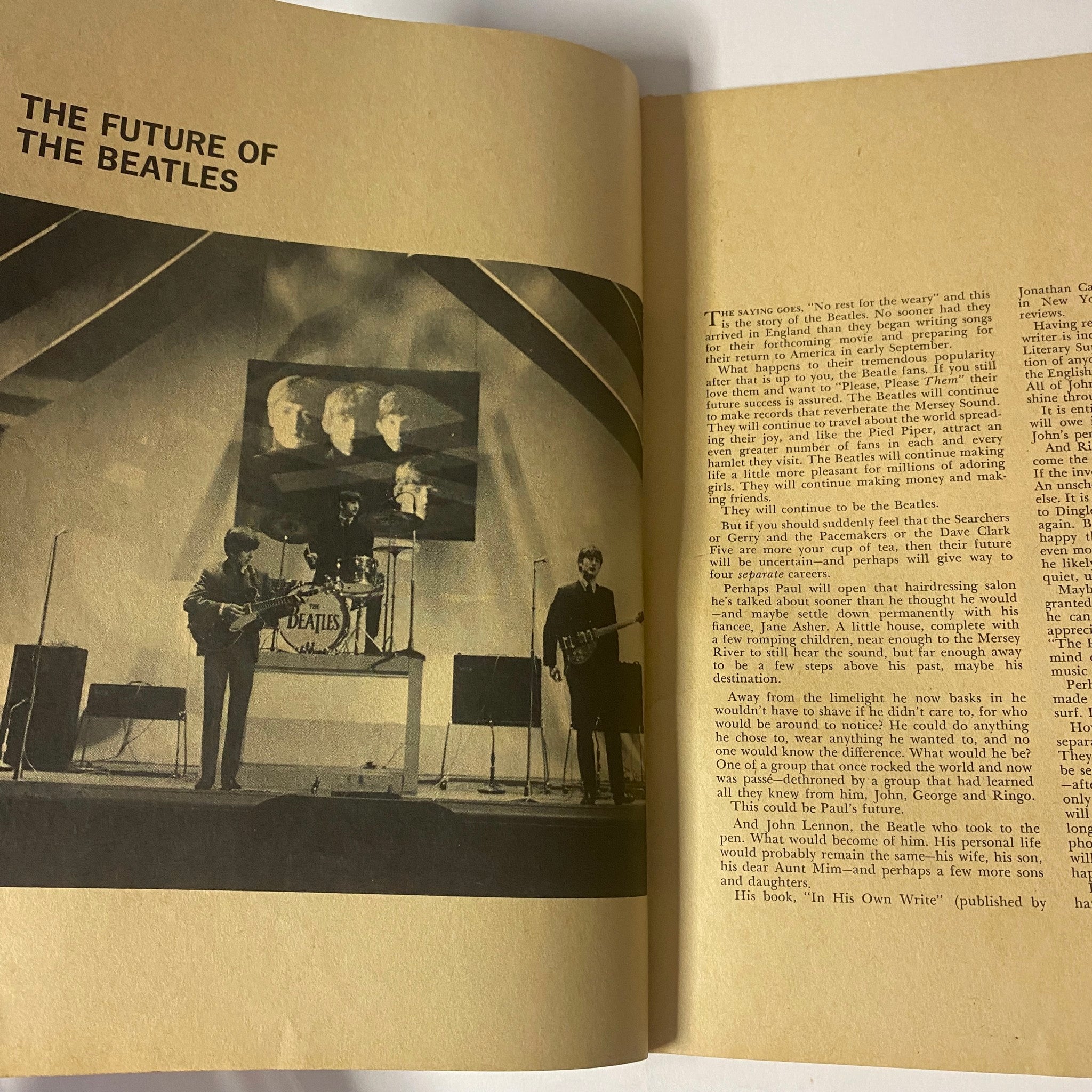 Photo of The Beatles performing at a large venue, featured in the magazine 'Who Will Beat The Beatles? The Mersey Sound Hits America'.