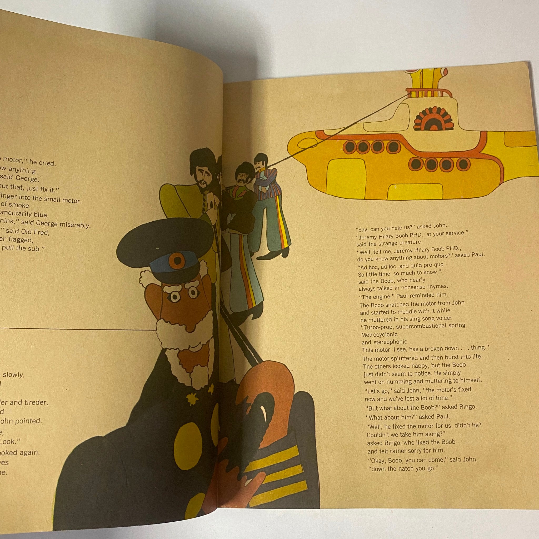 Illustrated interior page of 1968 The Official Beatles Yellow Submarine Magazine depicting a scene from the animated film with characters and the Yellow Submarine.
