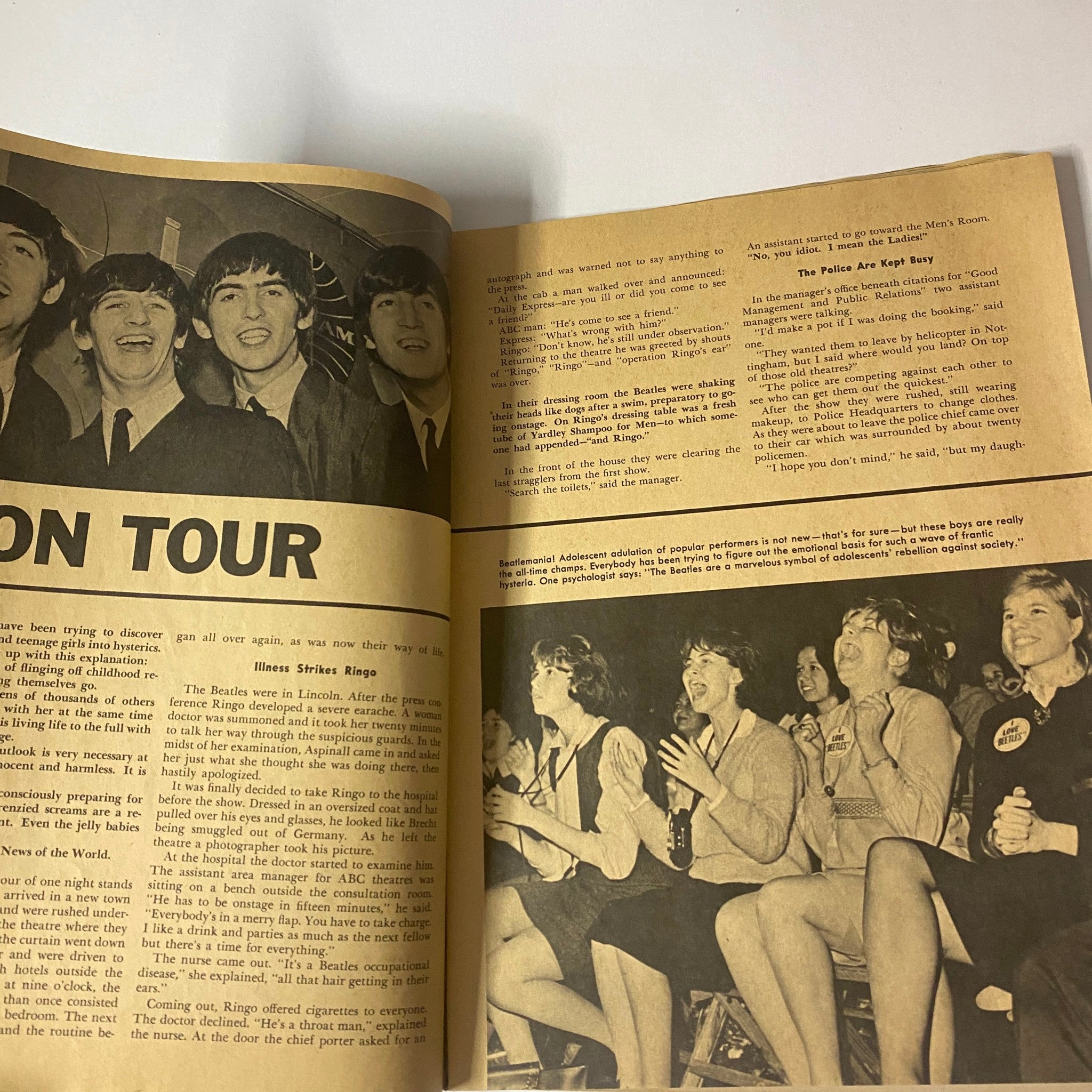 Interior page from '1964 The Real True Beatles Number One' by Michael Braun depicting The Beatles on tour, highlighting their enthusiastic fans and lively performances.