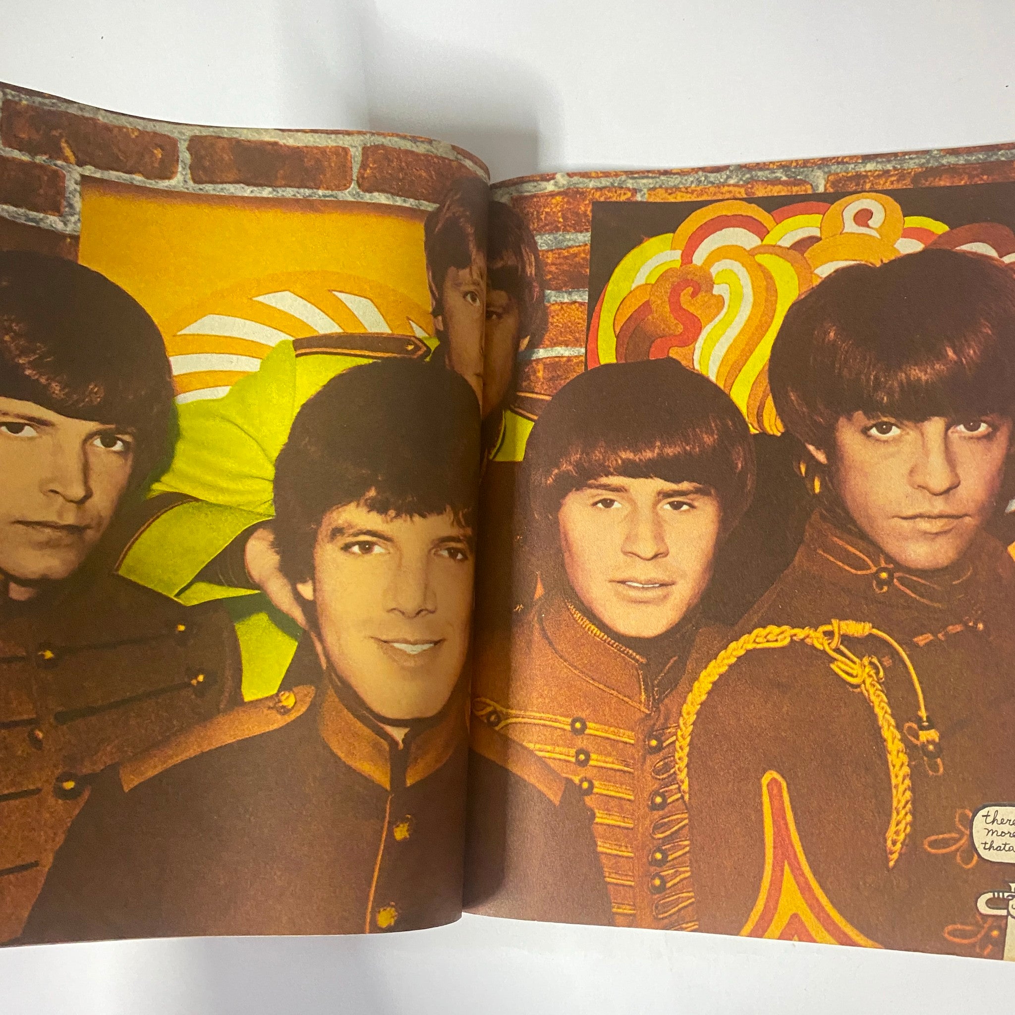Four male figures posing together in vintage attire from the 16 Magazine November 1967 Vol 9 No. 6 The Beatles issue, showcasing the colorful style of 1960s rock music.