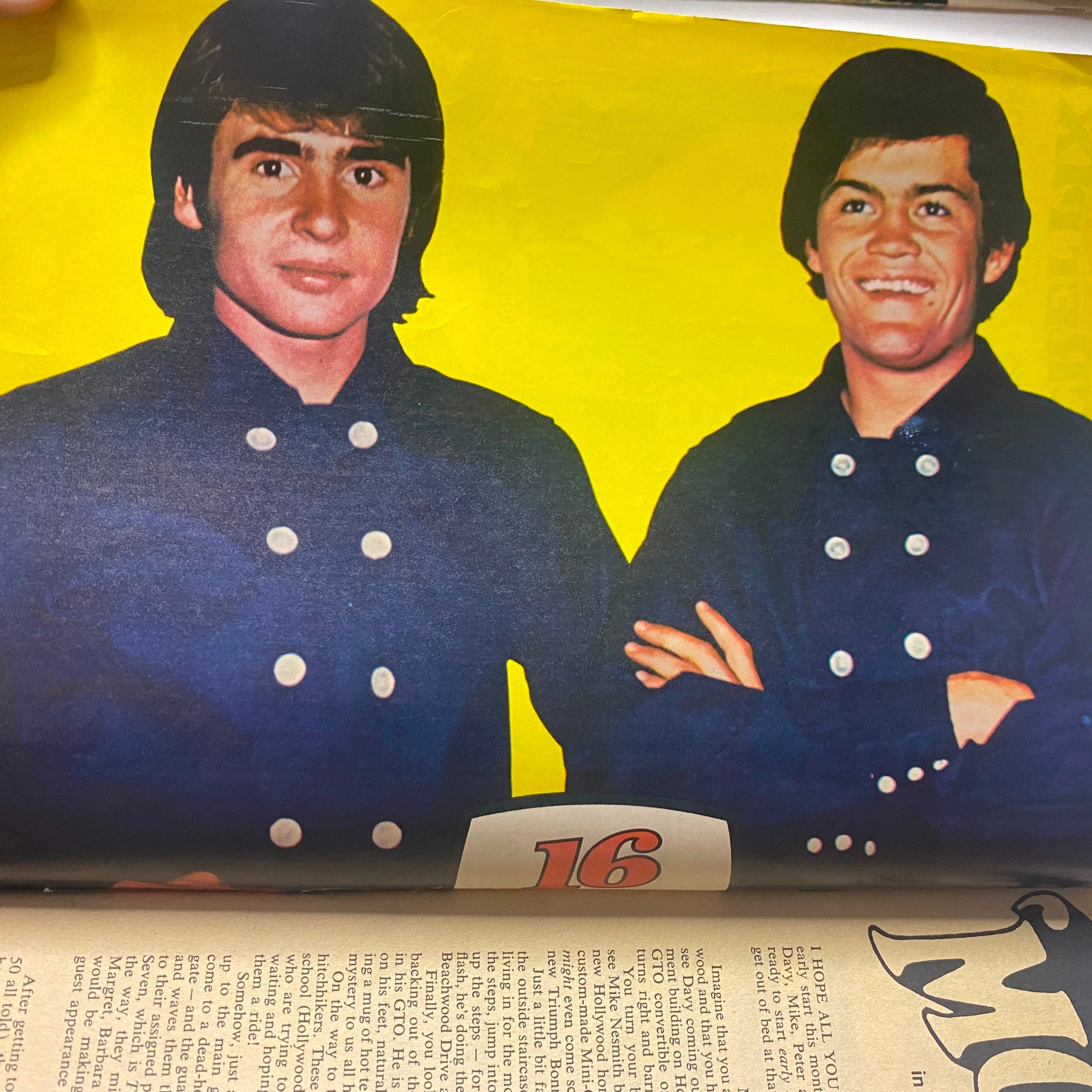The Monkees featured in 16 Magazine July 1967 Vol 9 No. 2, showcasing two band members in stylish attire against a vibrant yellow background.
