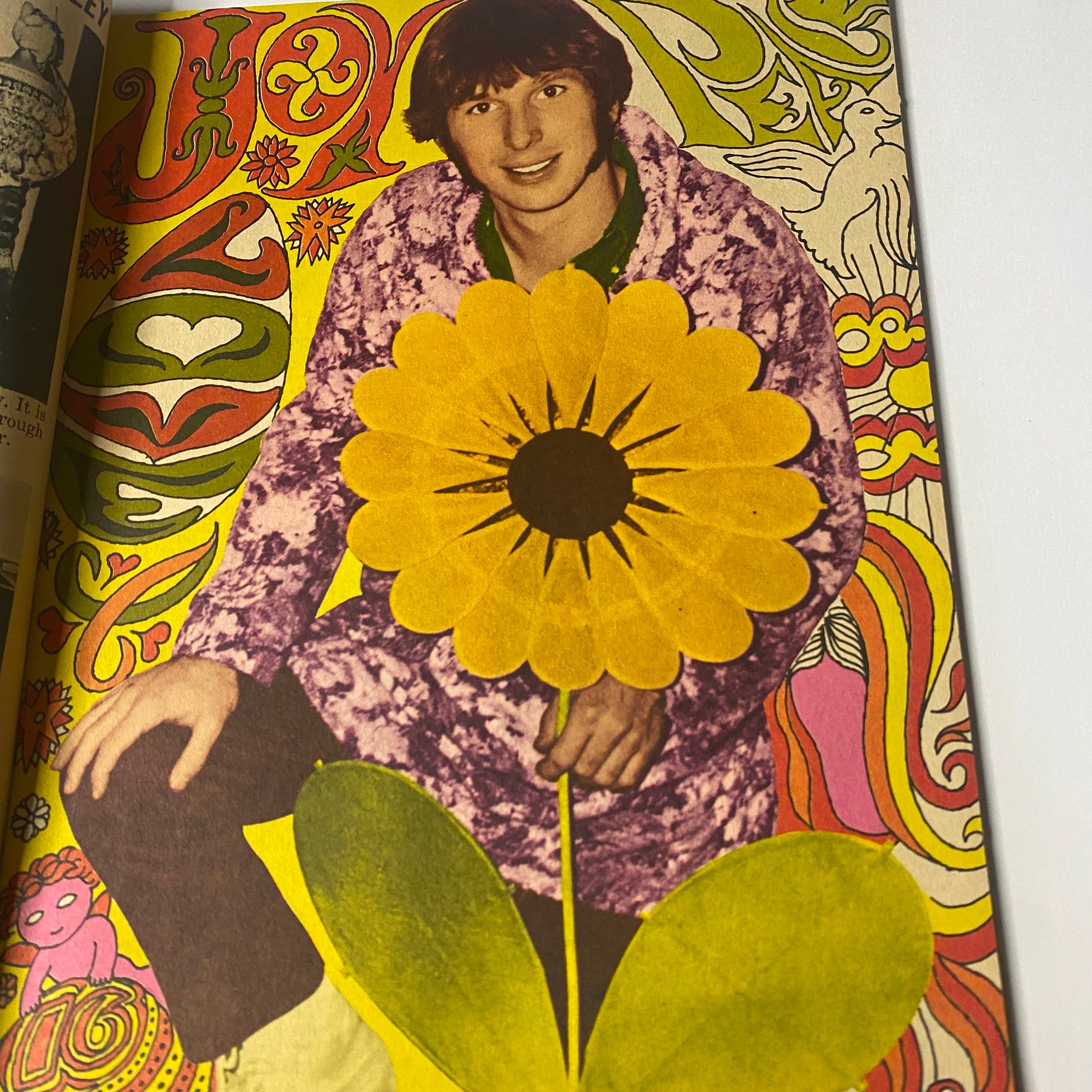 Colorful psychedelic art of a Monkee from 16 Magazine July 1967 Vol 9 No. 2, depicting him with a flower, embodying the 1960s retro aesthetic.